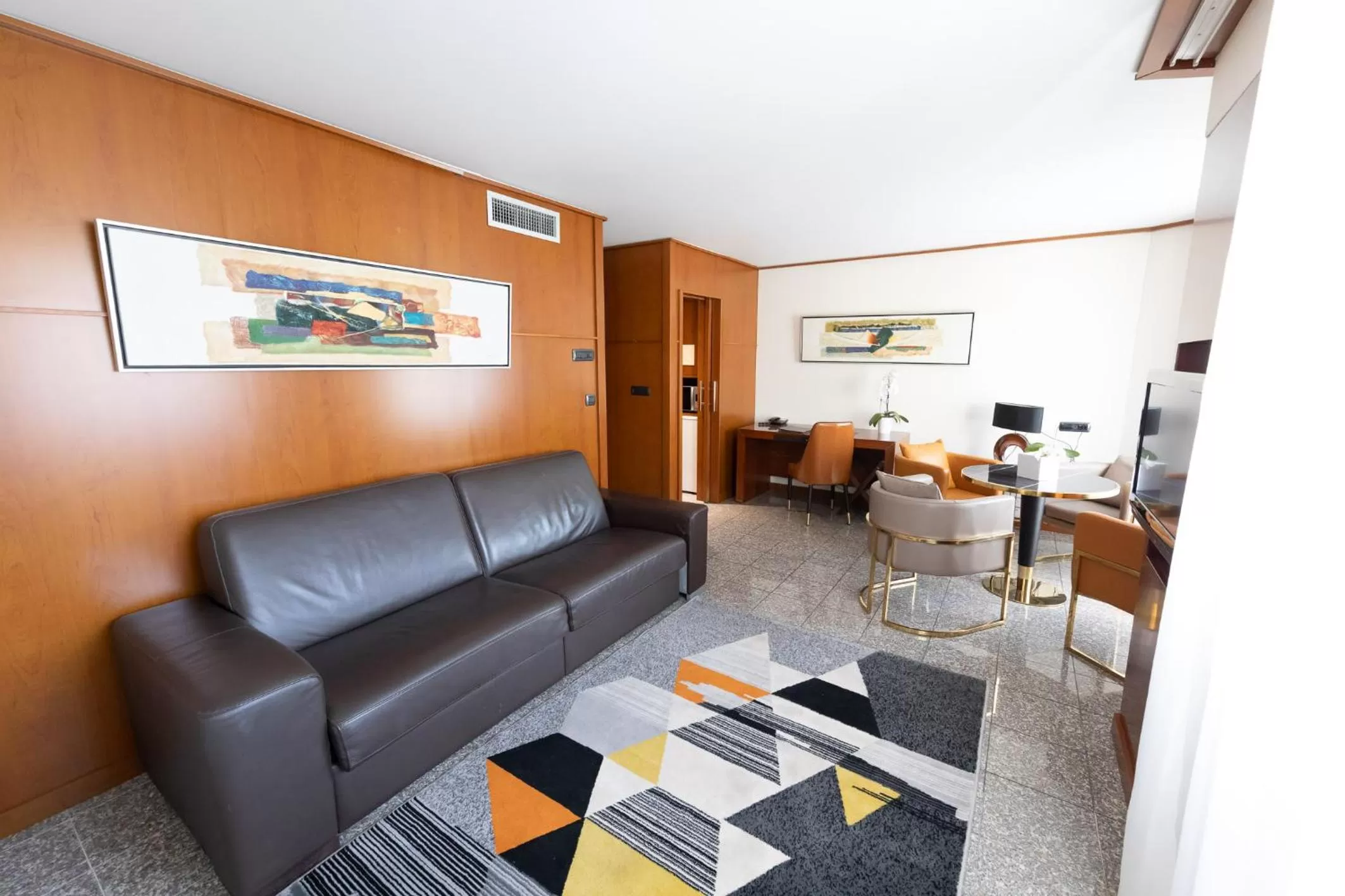 Bed in Goldstar Apartments & Suites