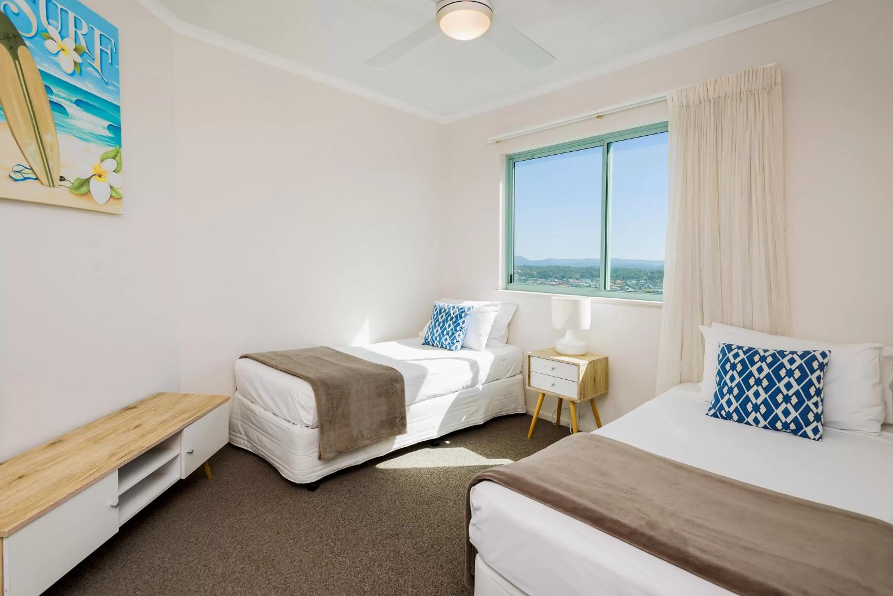 Photo of the whole room, Bed in The Waterford on Main Beach