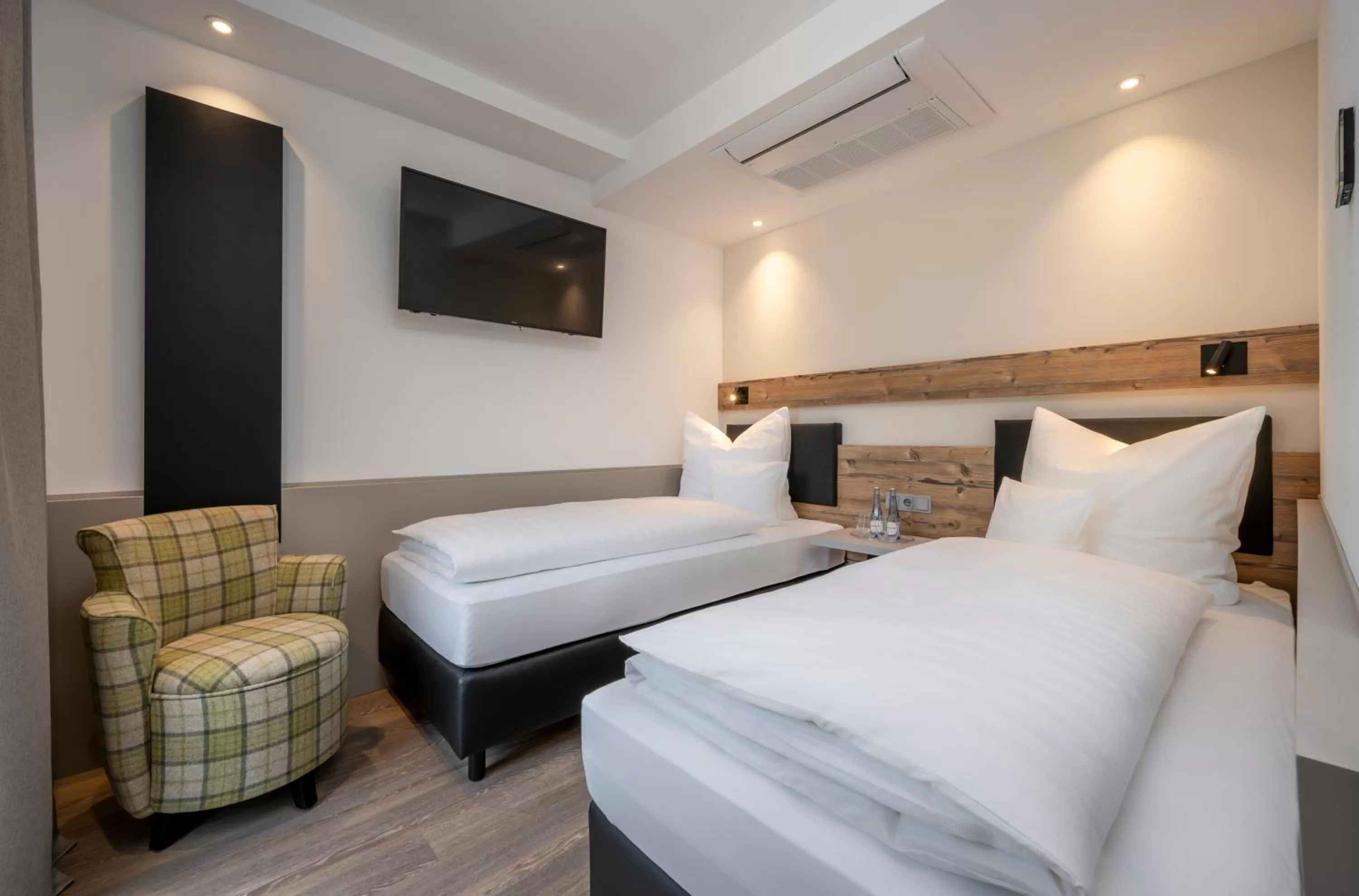 Photo of the whole room, Bed in Köhlers Forsthaus Wellness & Genuss Hotel