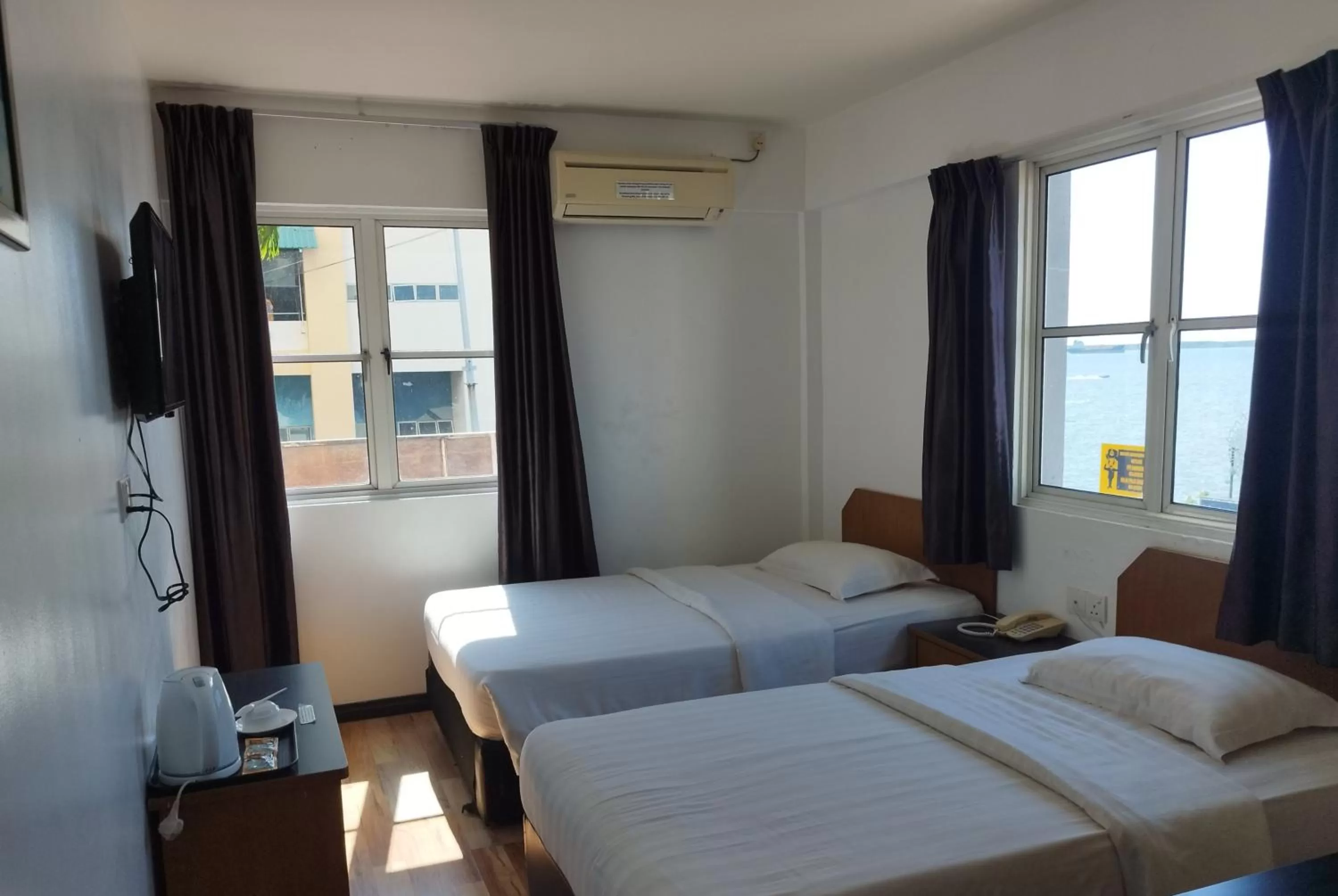 Bed in Marine Bay Hotel