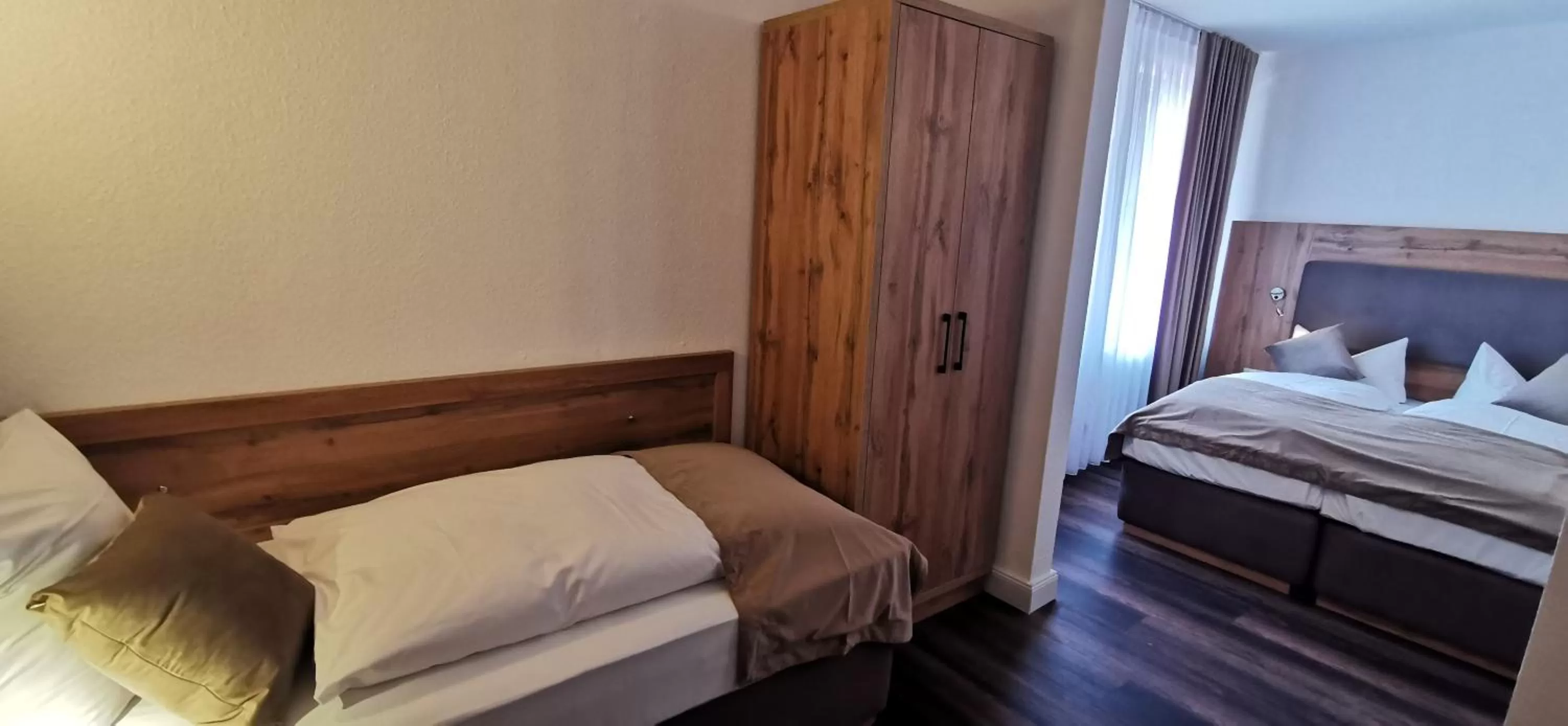 Photo of the whole room, Bed in Heidehotel Soltauer Hof