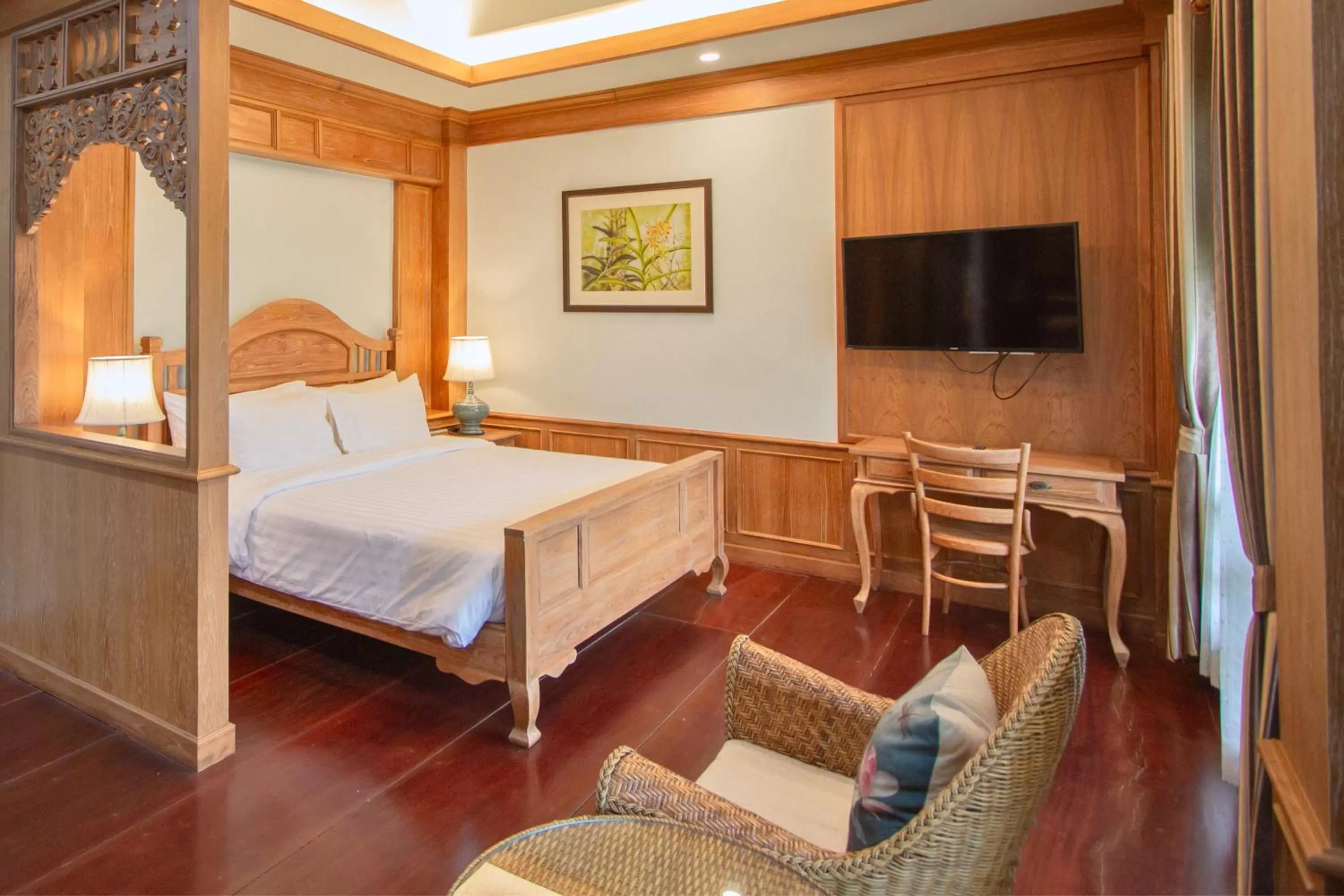 Bed in Rich Garden House Hotel