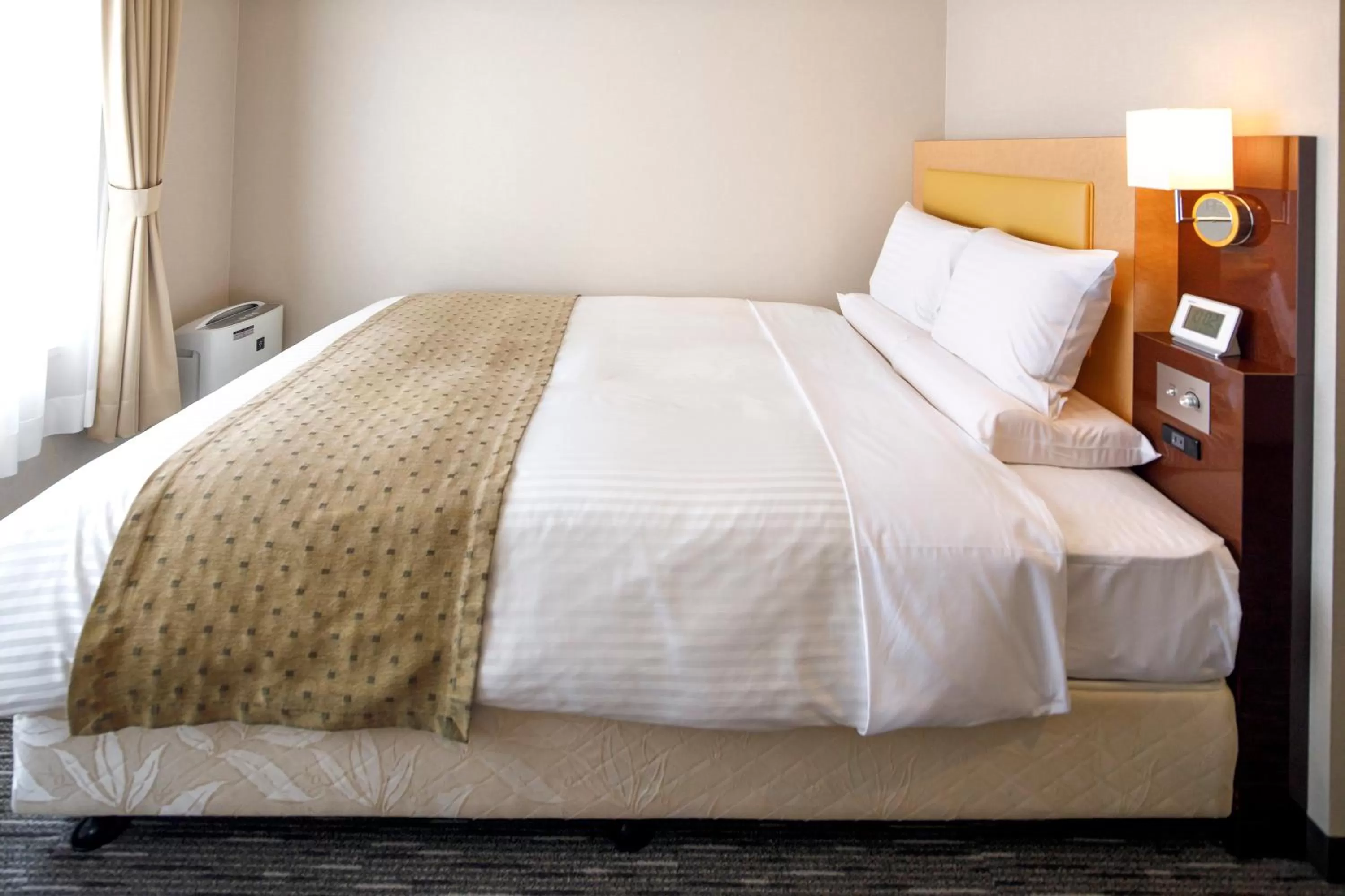 Bed in HOTEL MYSTAYS Hakodate Goryokaku