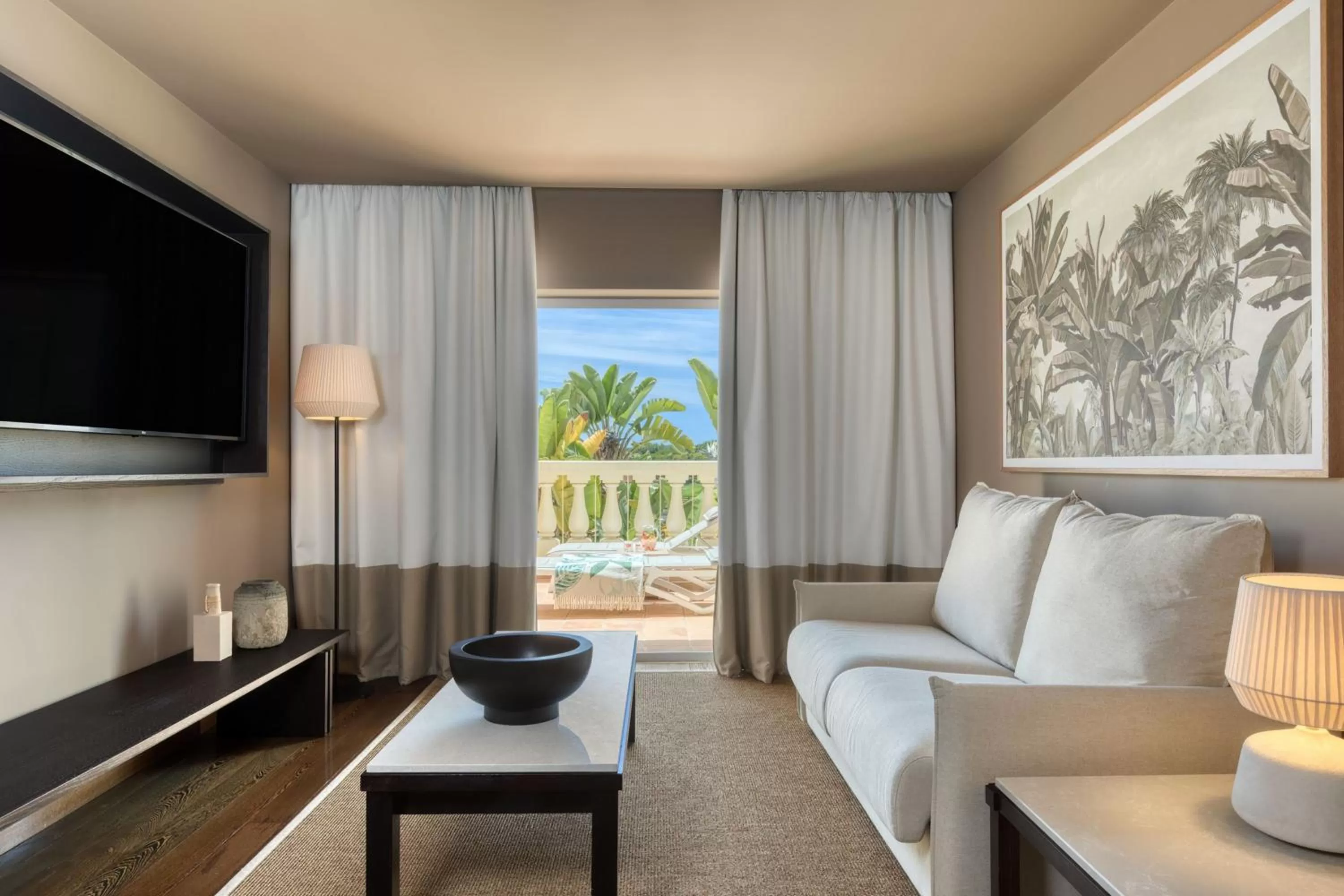 Living room in Domes Lake Algarve, Autograph Collection