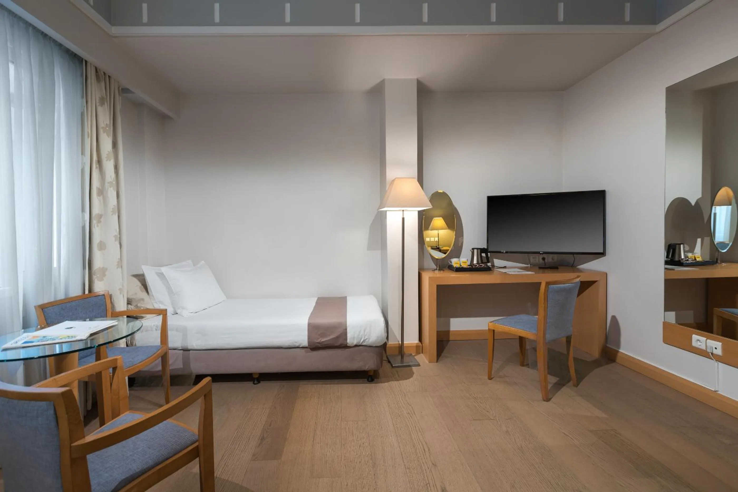 Photo of the whole room, Bed in Central Hotel