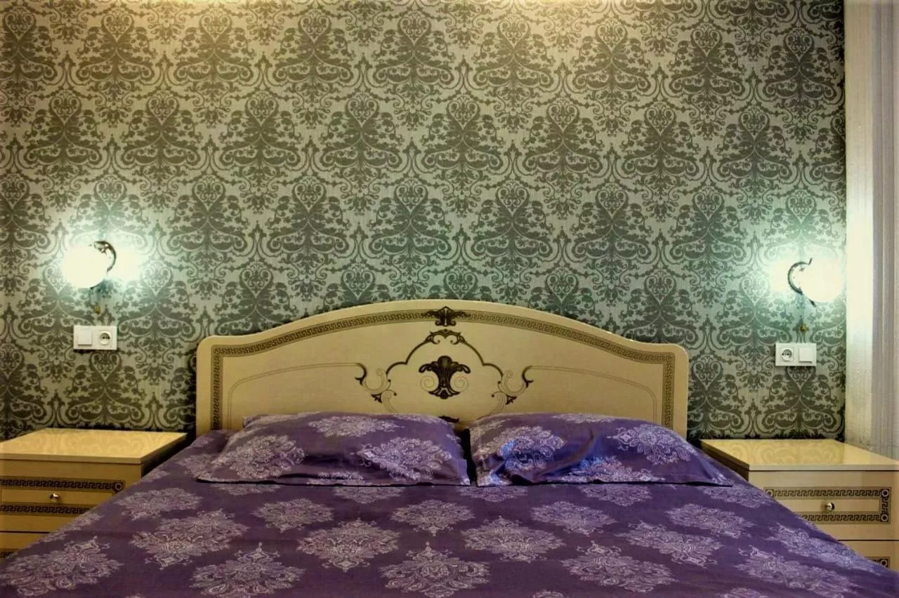 Bed in Orbi Lux Apartment