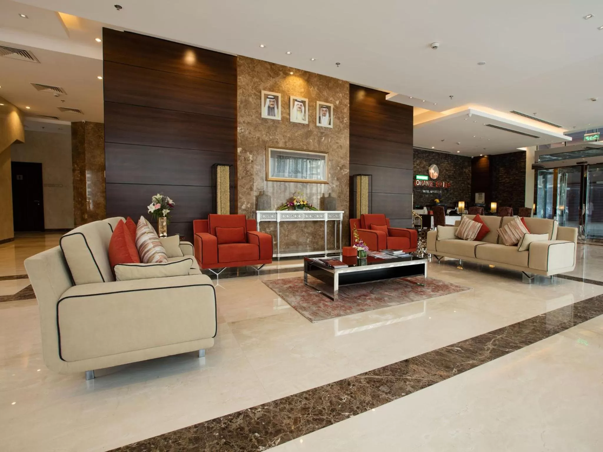 Lobby or reception in Orange Suites Hotel