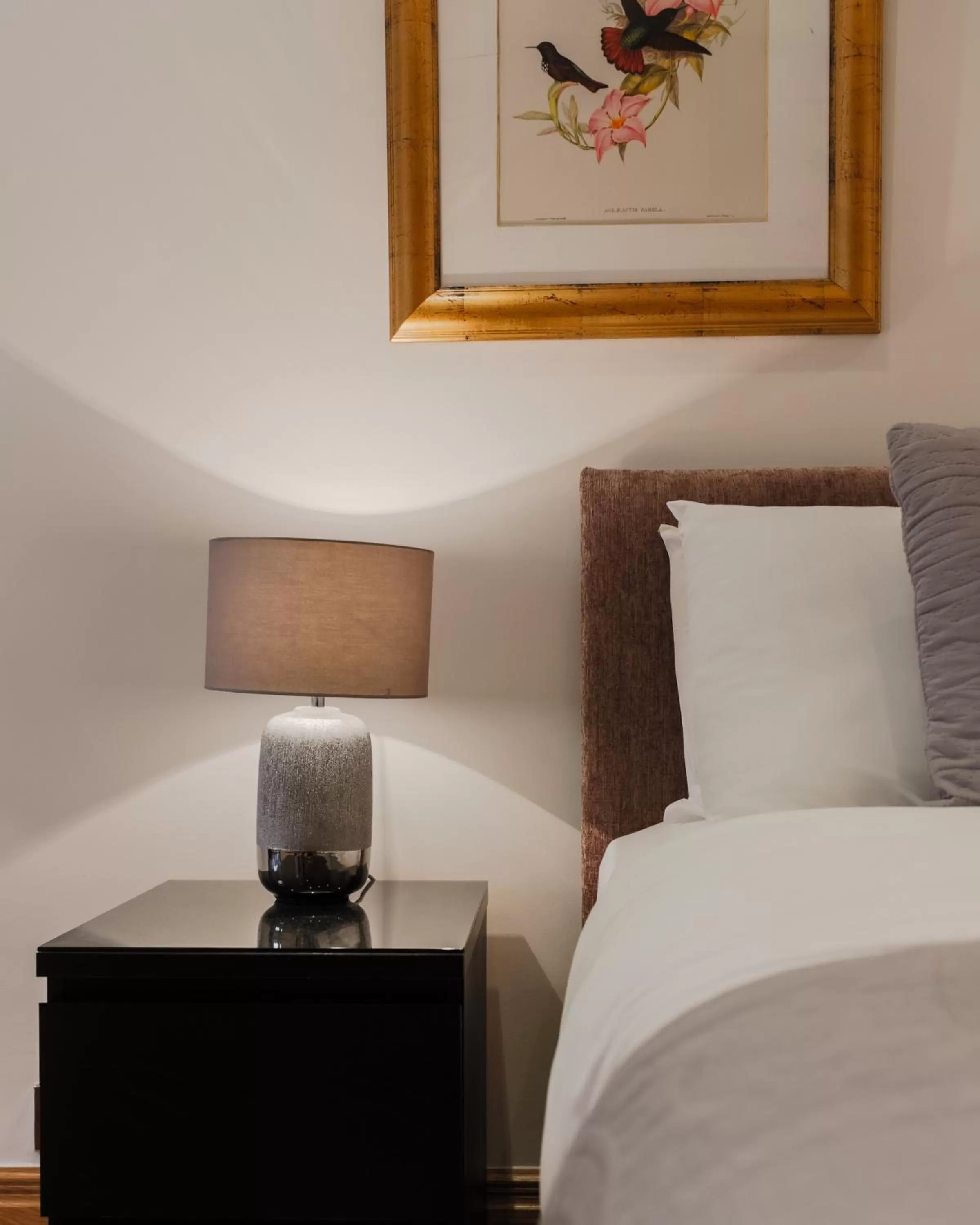 Decorative detail, Bed in Monument Apartments