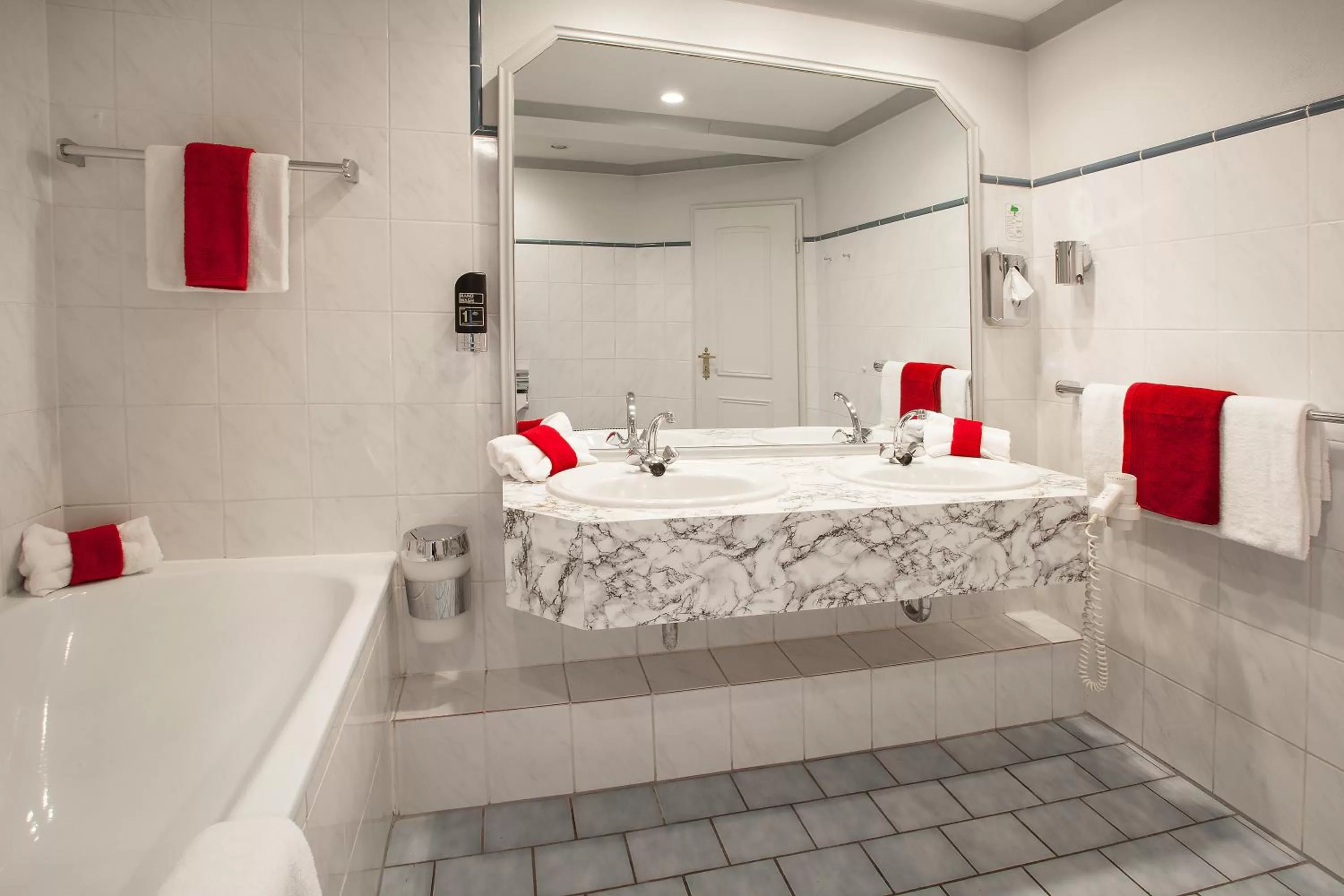 Bathroom in INA Hotel Royal