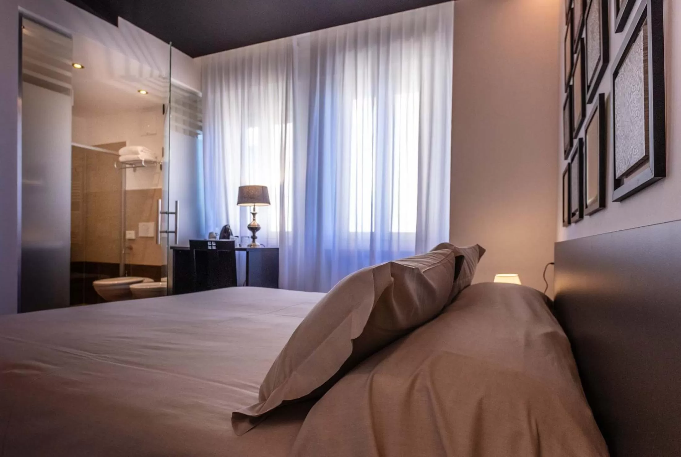 Bed in Art Hotel Ventaglio