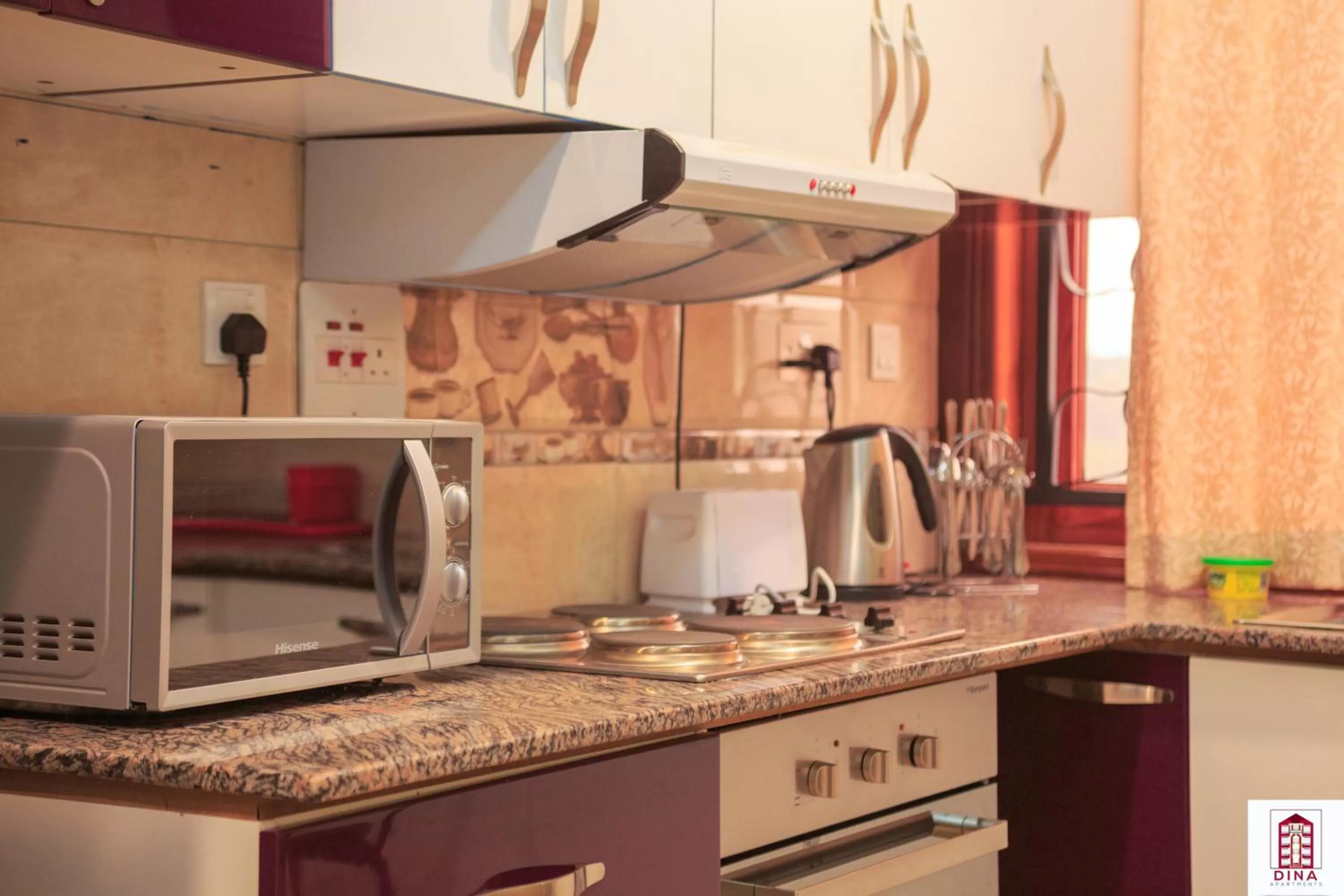 Kitchen or kitchenette in Dina Apartments