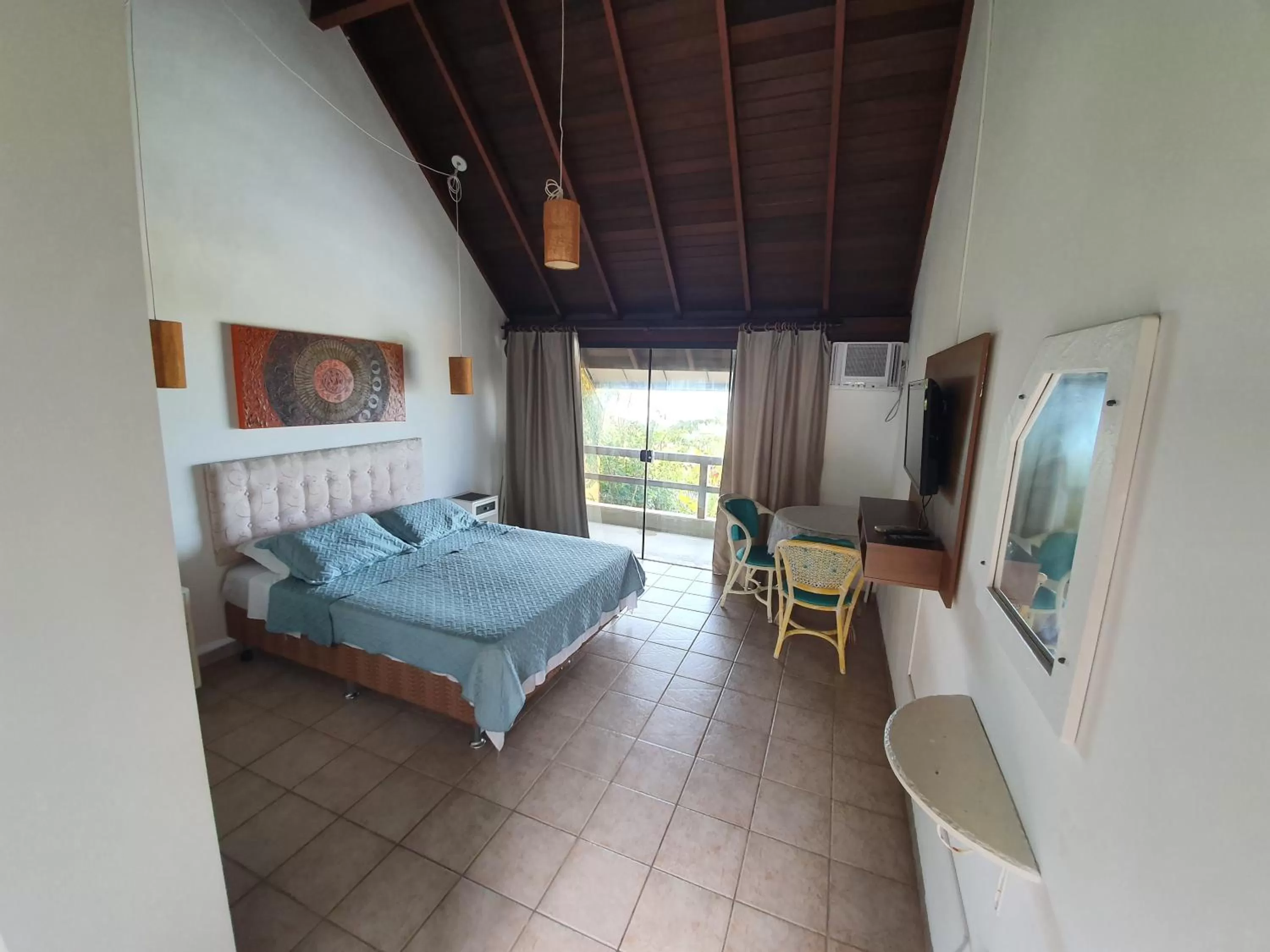 Photo of the whole room, Bed in Pousada Bangalôs Da Mole - Florianópolis