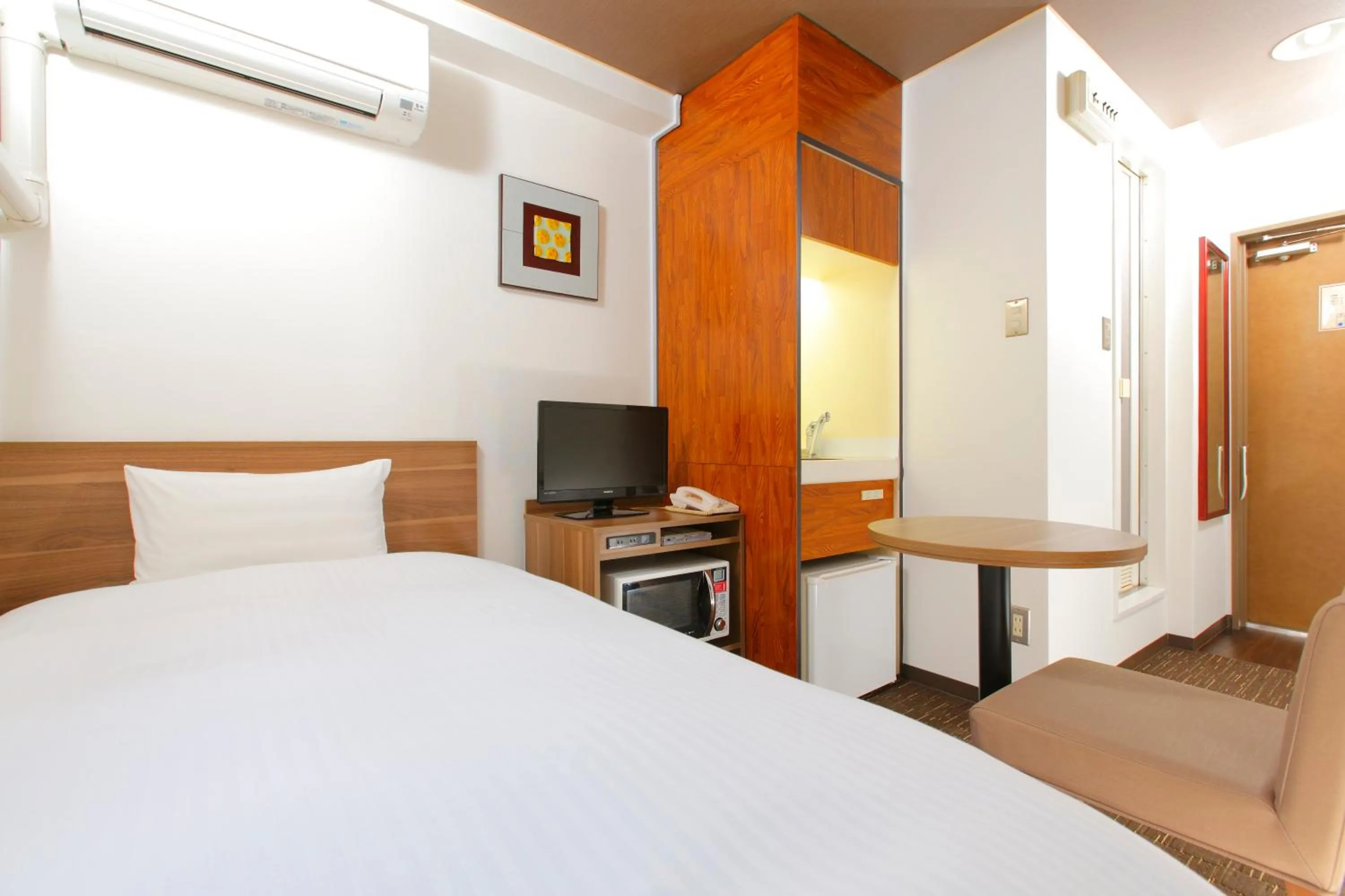 Bed in FLEXSTAY INN Kawasaki Ogawacho