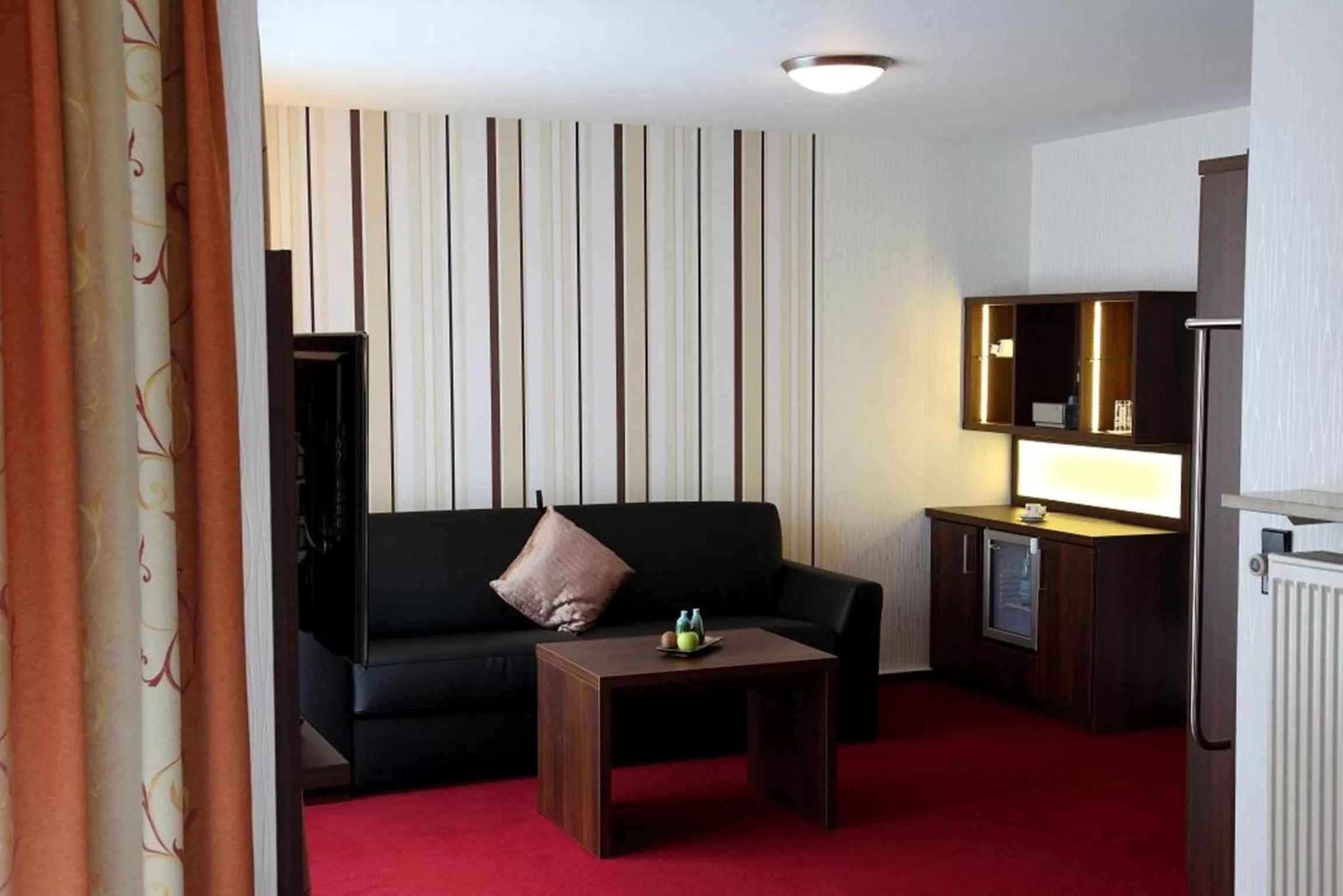 Seating area in Lobinger-Parkhotel