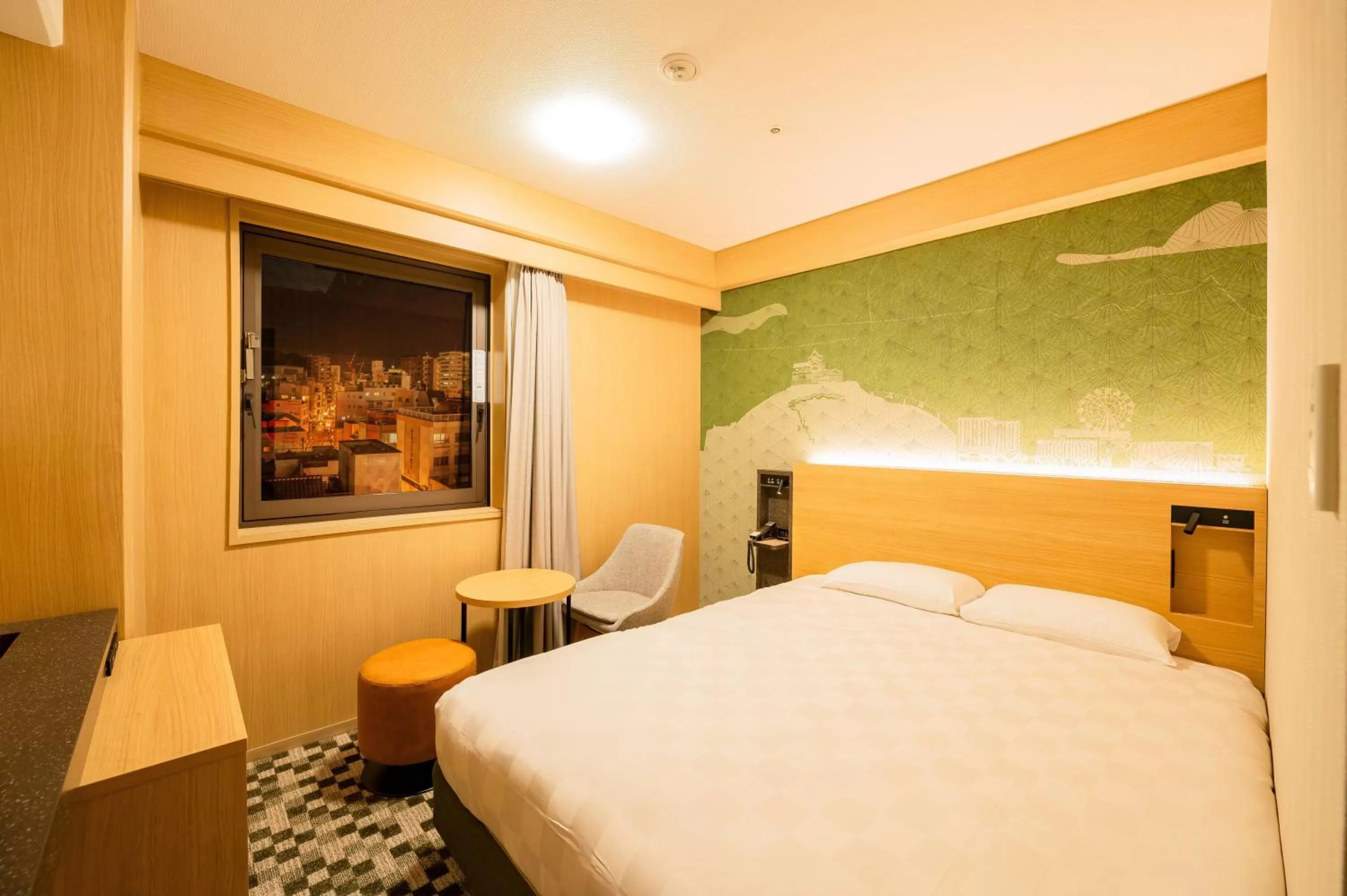 Bed in Matsuyama Tokyu REI Hotel