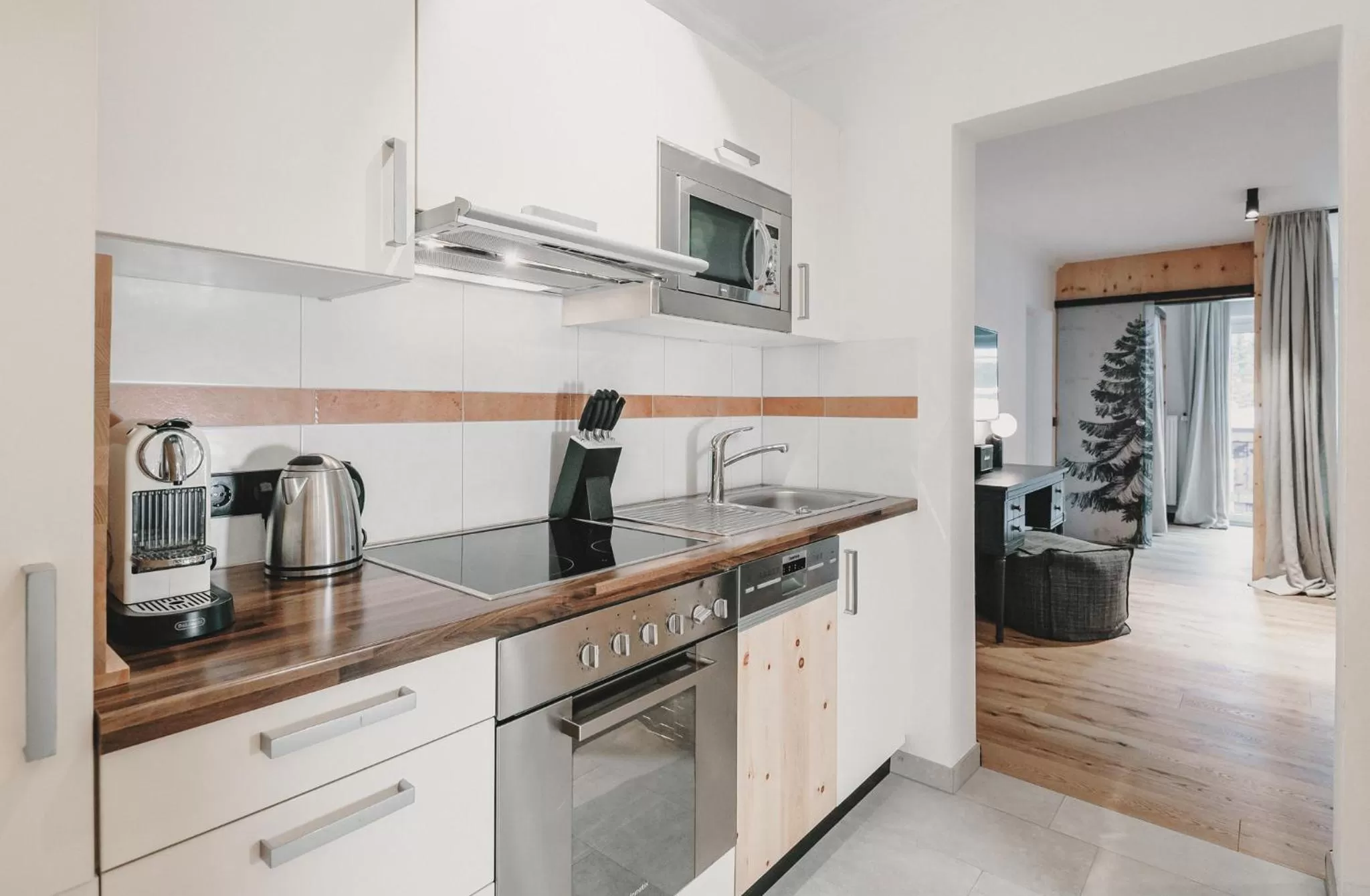 Kitchen or kitchenette in Hotel & Appartements Tiroler Buam