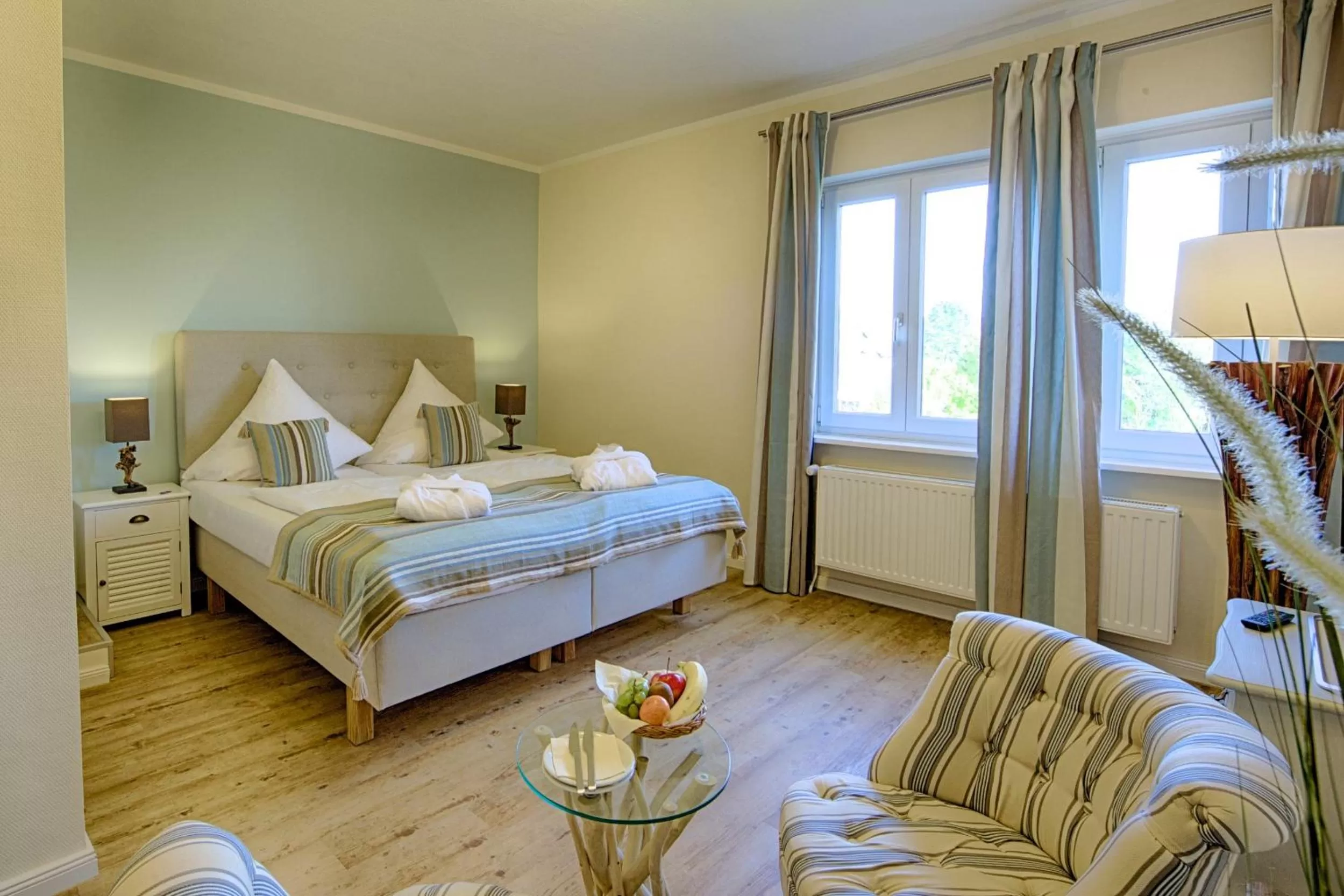 Photo of the whole room, Bed in Das Frühstückshotel Sankt Peter-Ording