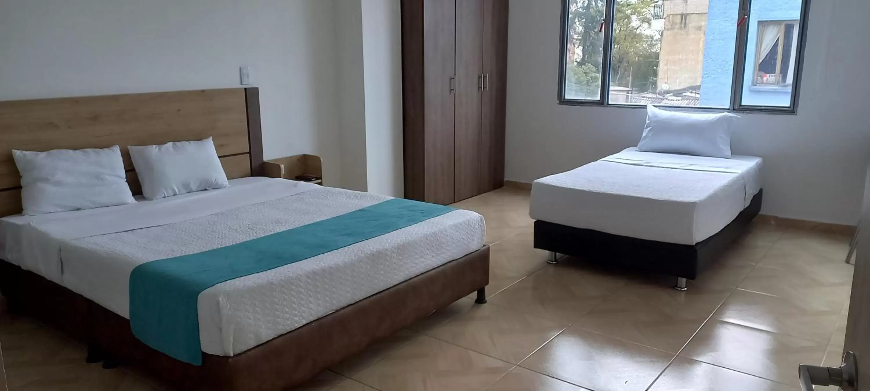 Property building, Bed in Hotel Royal Cid Bogota