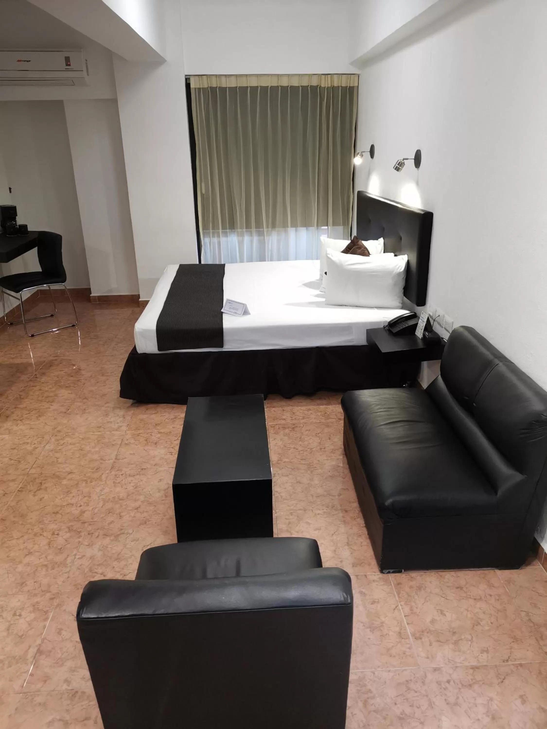 Living room, Bed in Hotel Maya Yucatan