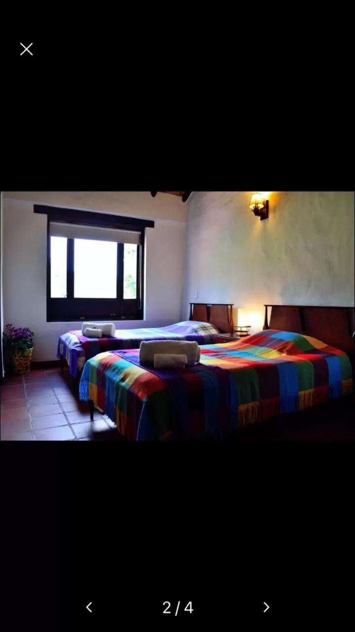 Twin Room in La Posada De Los Arcángeles