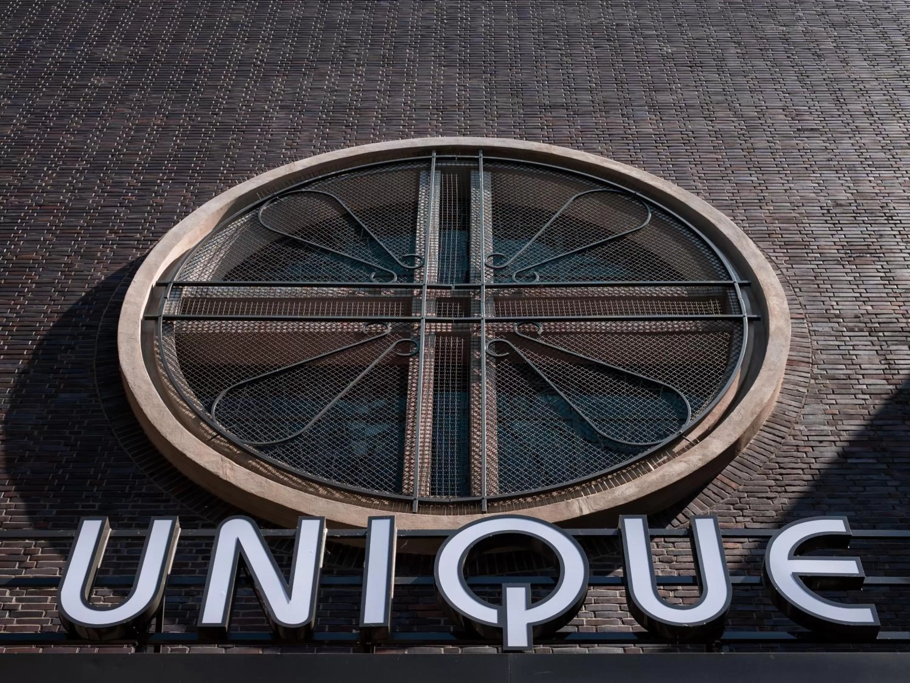 Property logo or sign in Hotel Unique Pearl