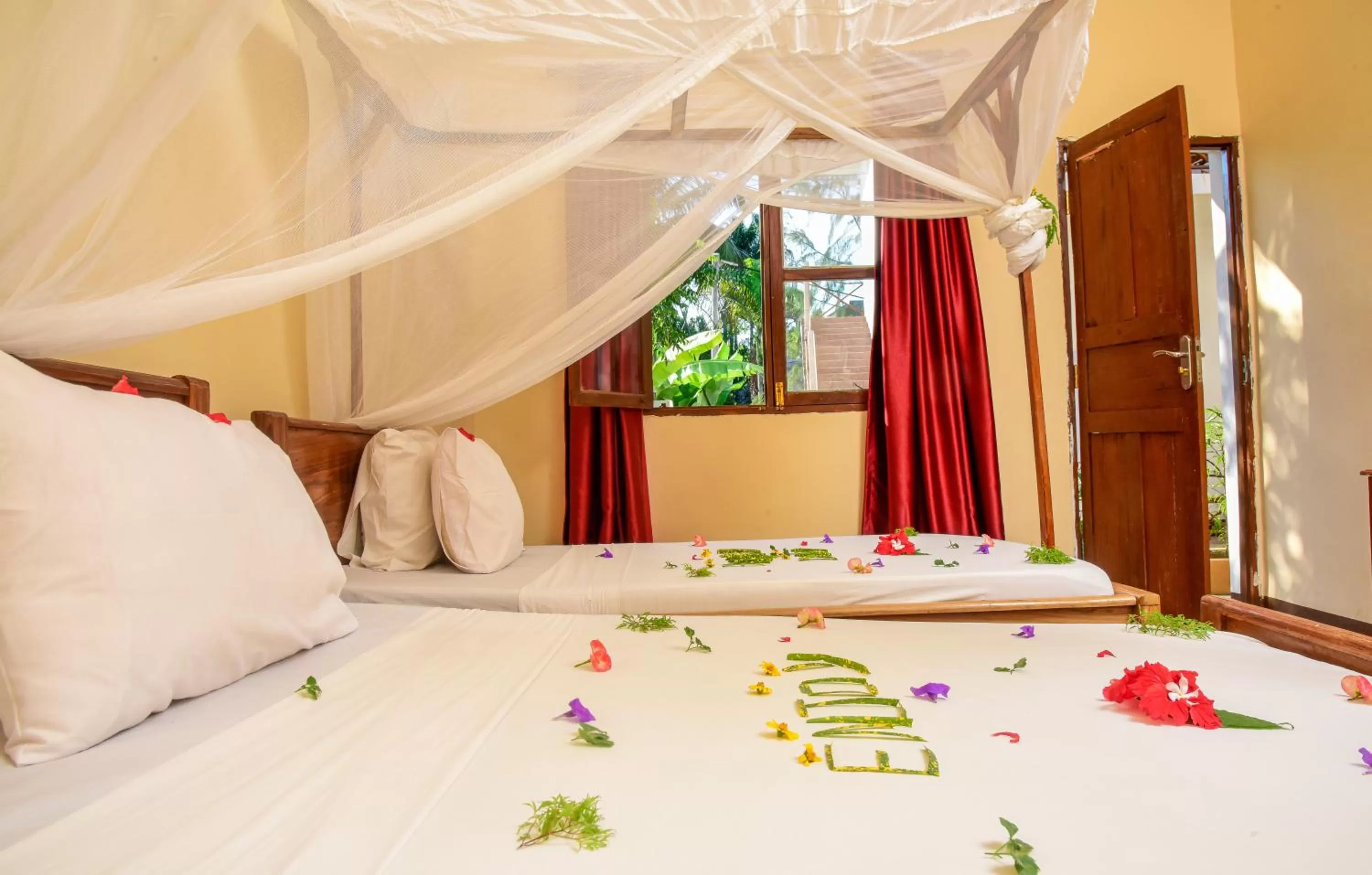 Bed in Amaan Beach Bungalows