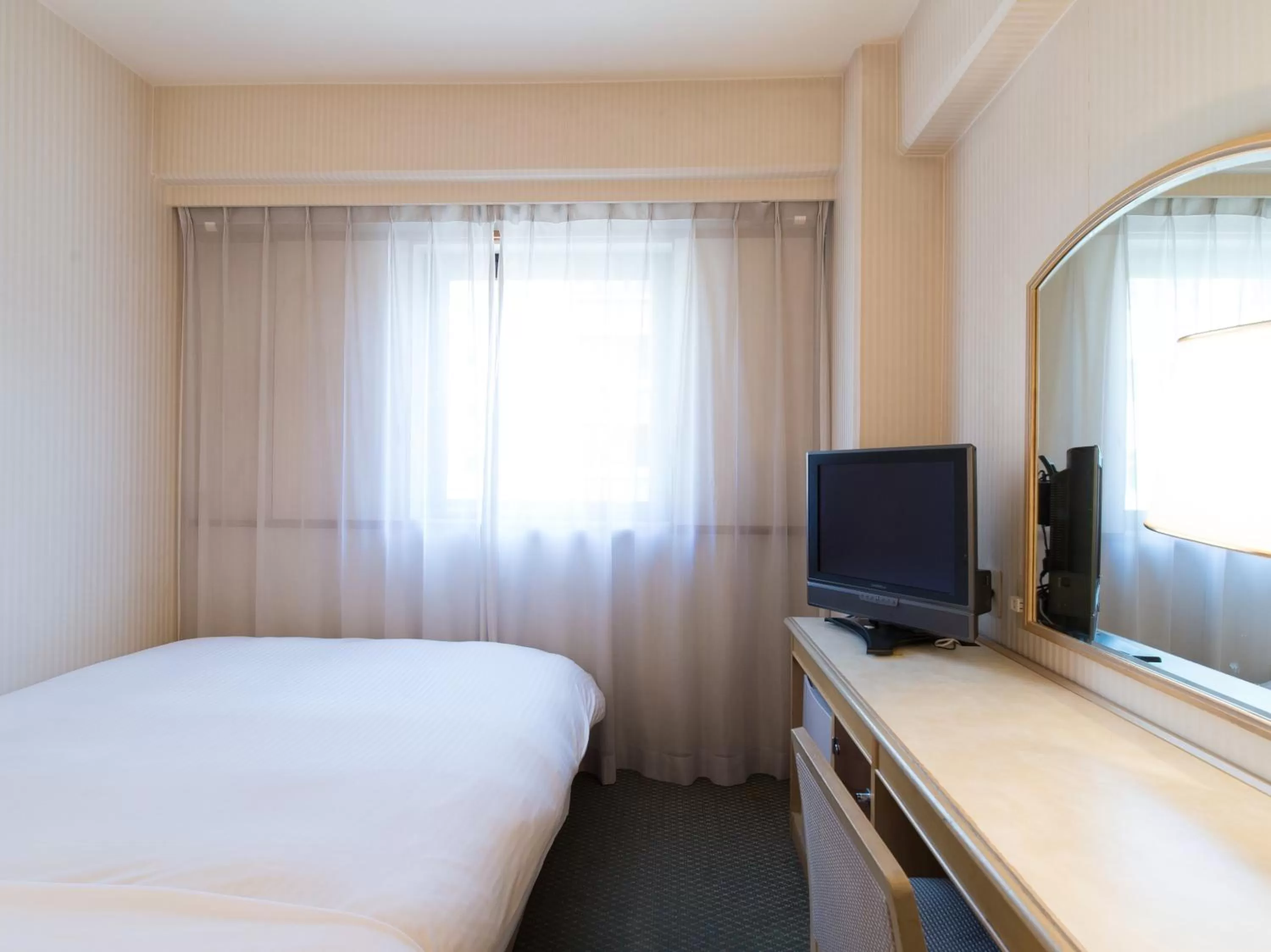 Photo of the whole room, Bed in Tabist Hotel Tetora Kitakyushu