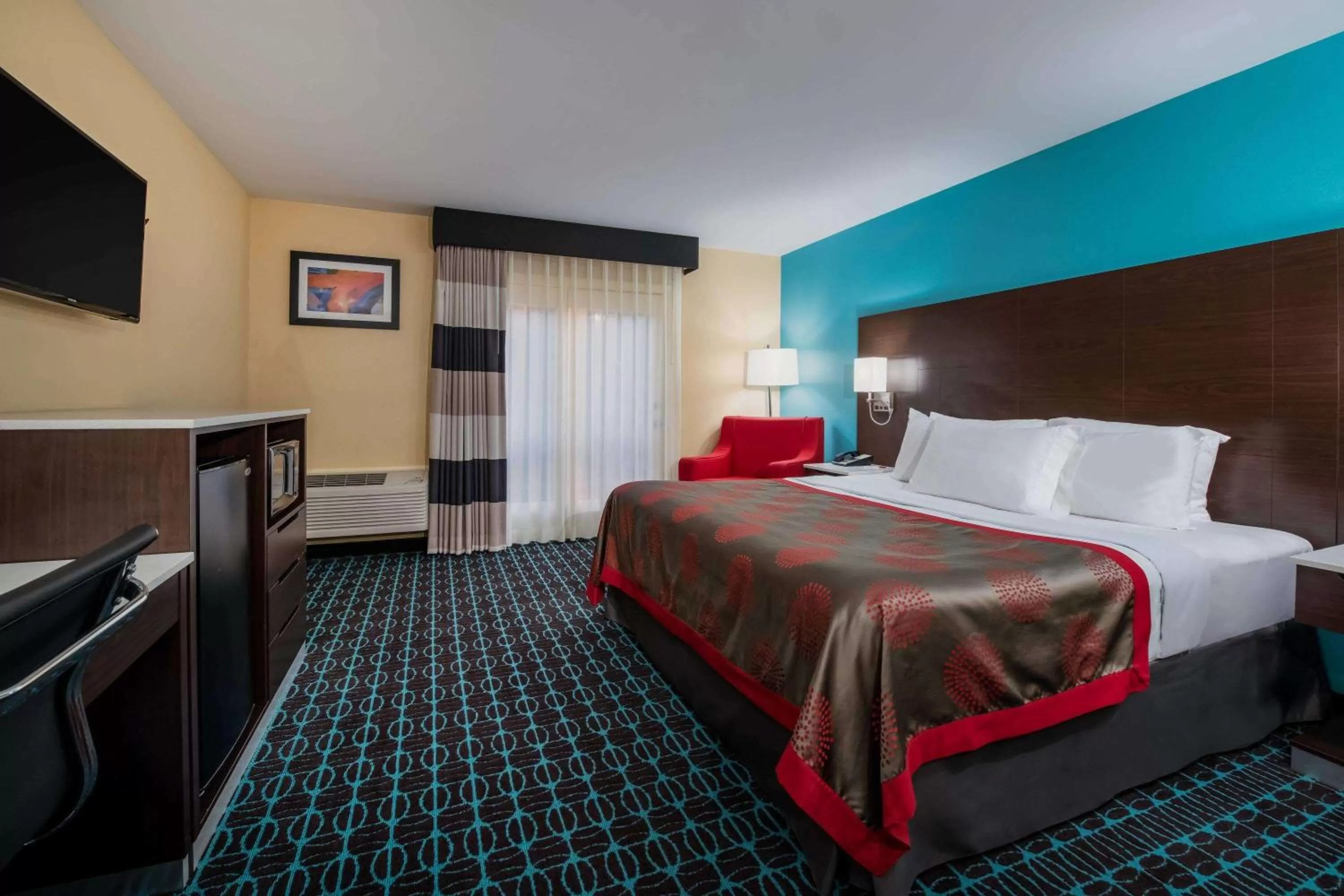 Photo of the whole room, Bed in Ramada by Wyndham Groton Mystic