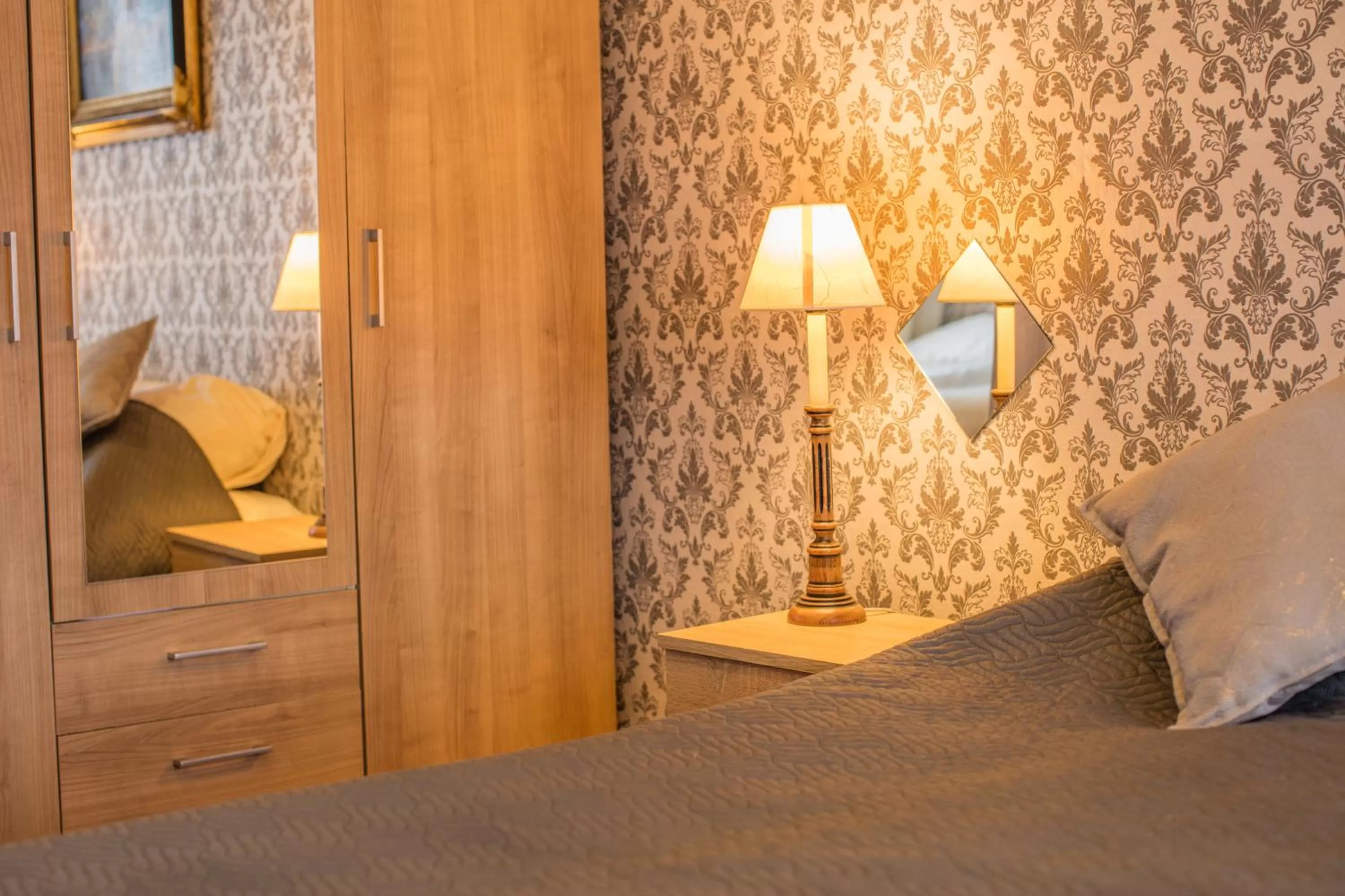 Bed in Hotel Le Provencal