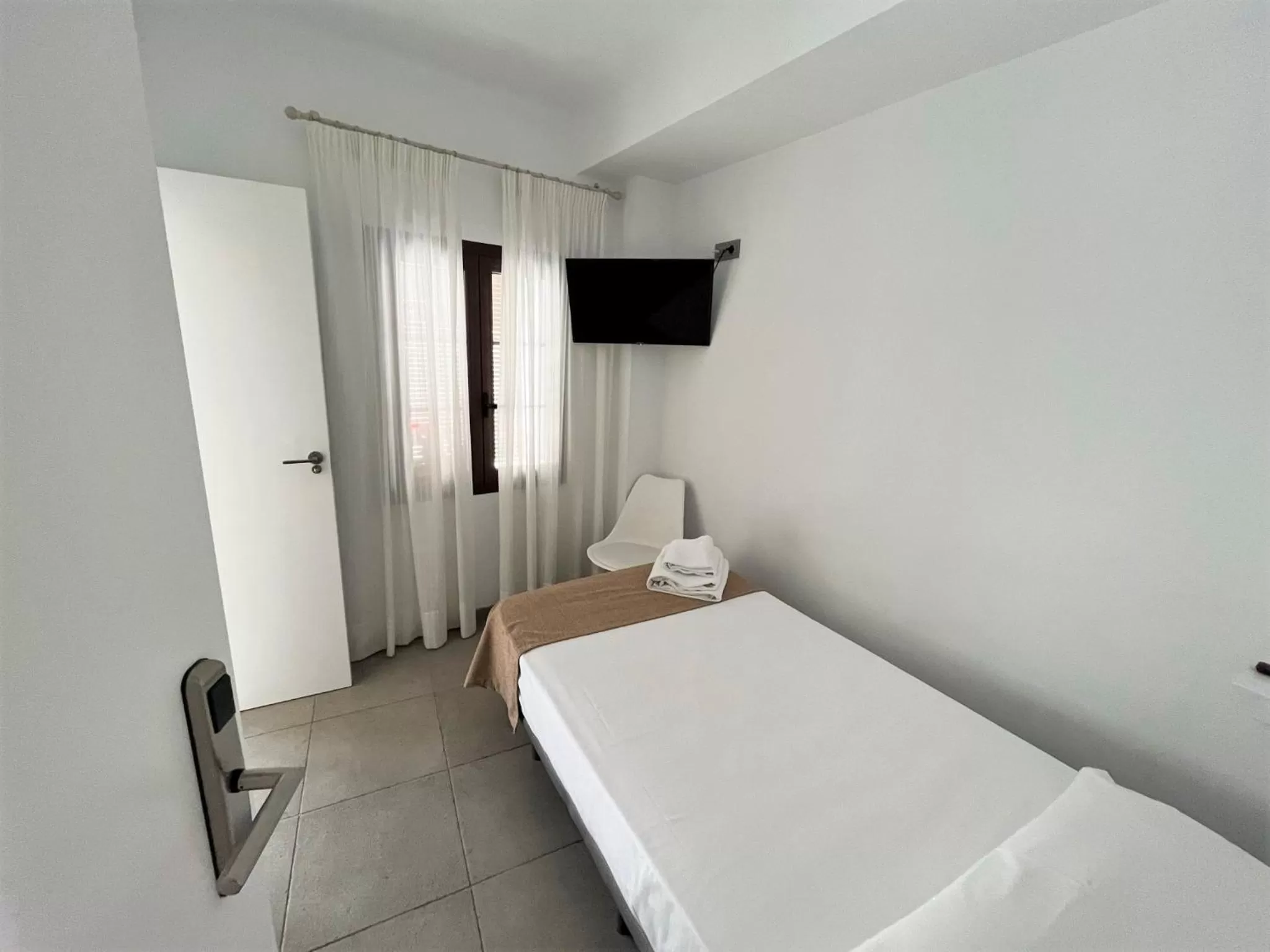 Photo of the whole room, Bed in Vitium Córdoba