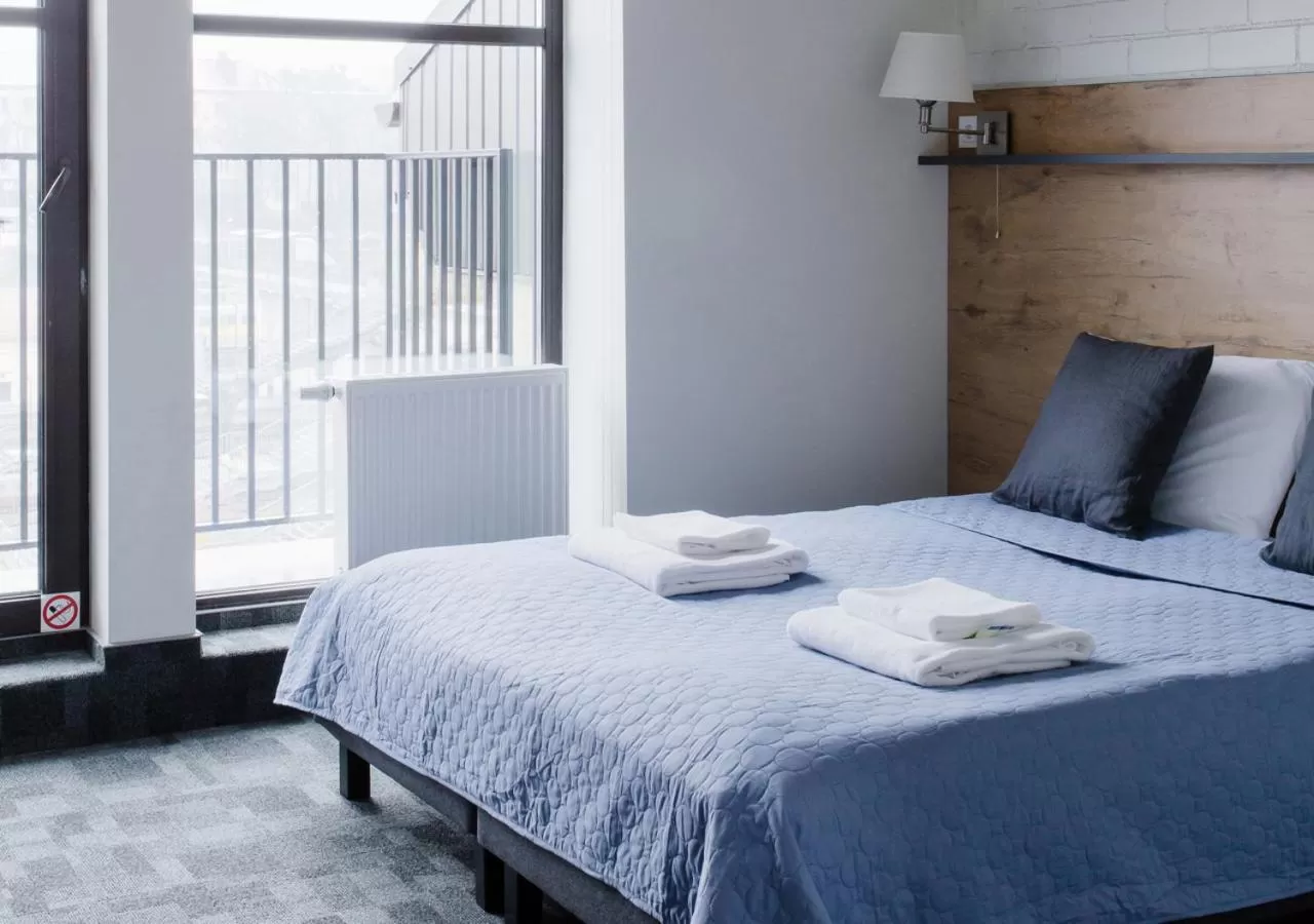 Bed in SELF CHECK-IN Hotel Railway Apartments