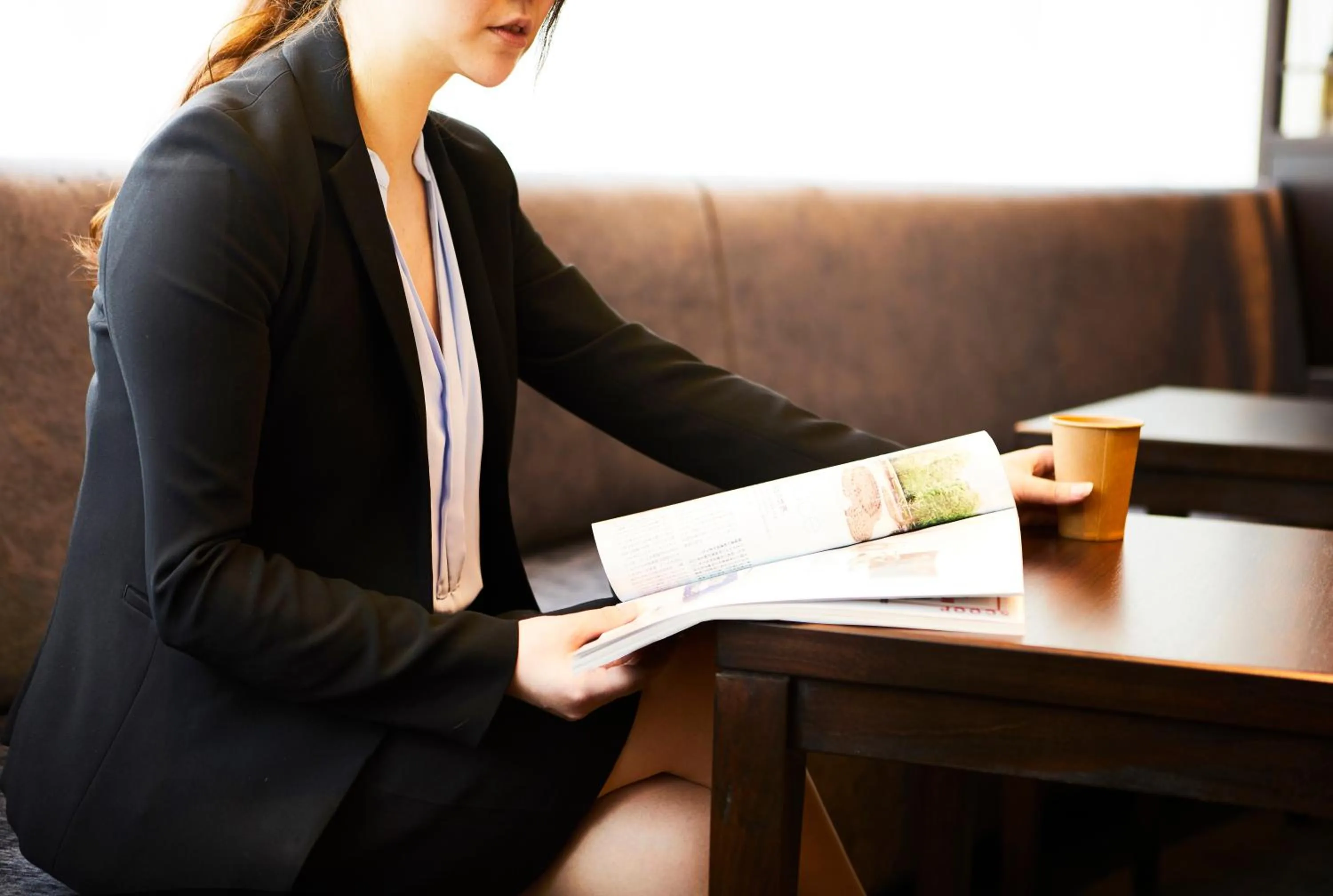 Communal lounge/ TV room in Ginza Grand Hotel