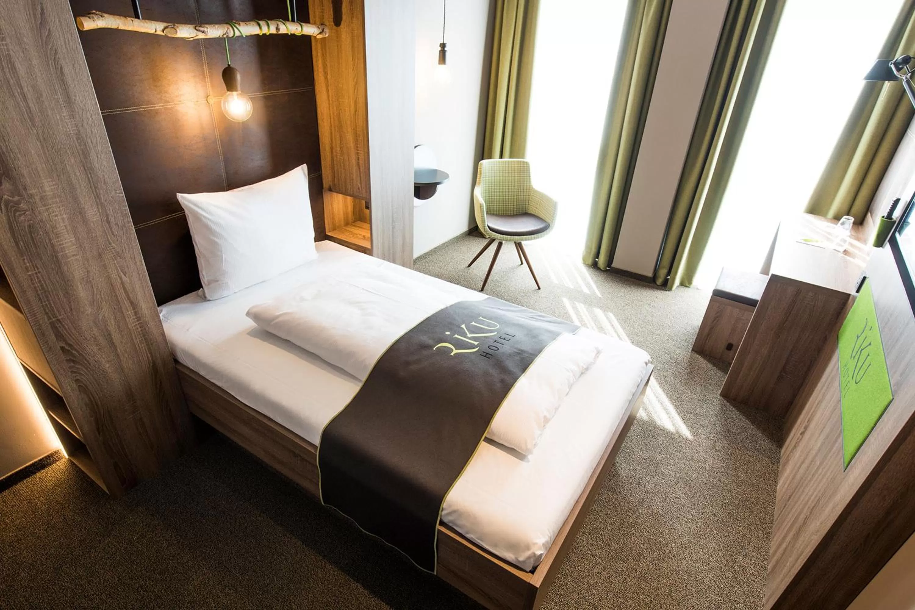 Photo of the whole room, Bed in RiKu HOTEL Ulm