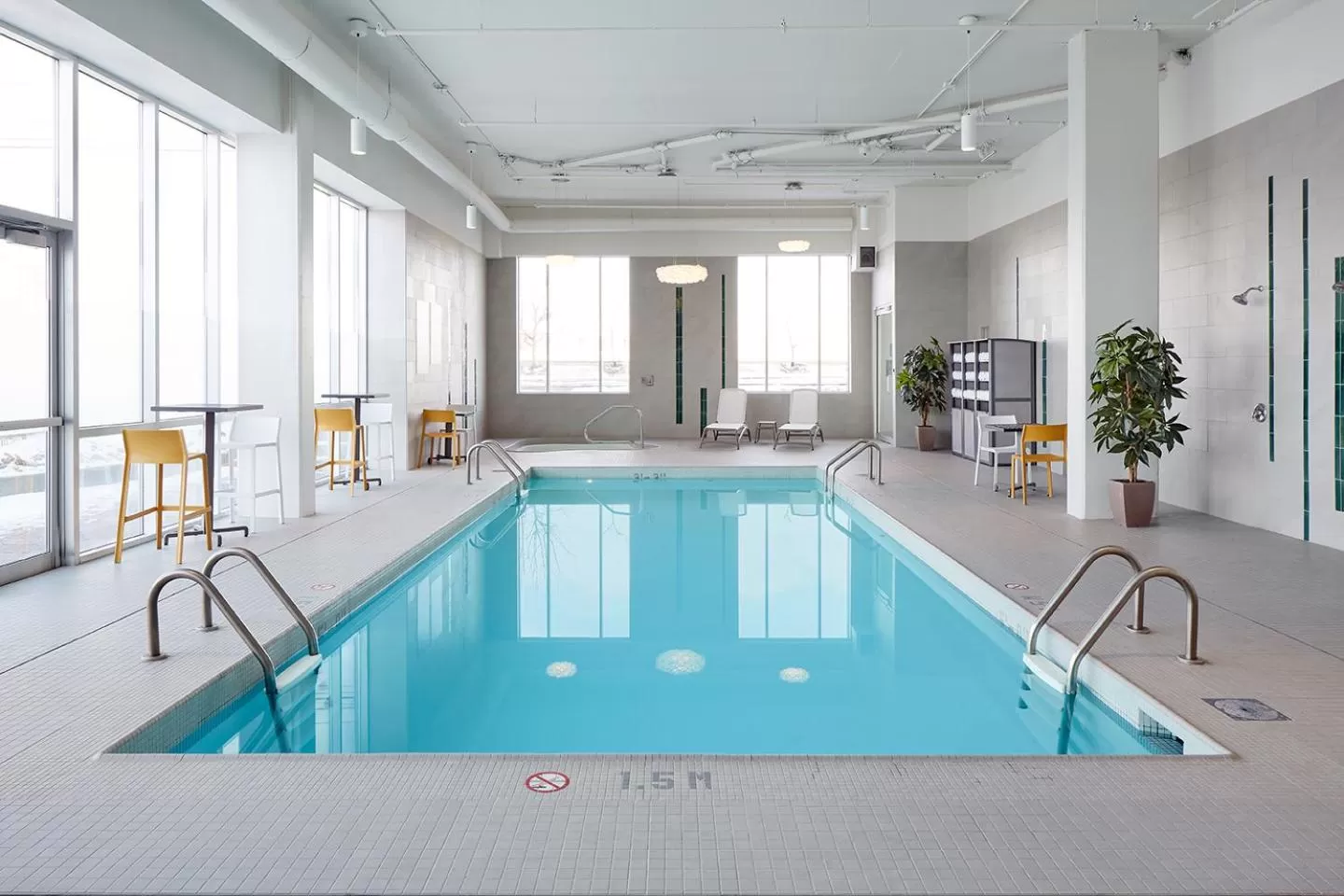 Swimming pool in Holiday Inn & Suites Montreal Airport by IHG
