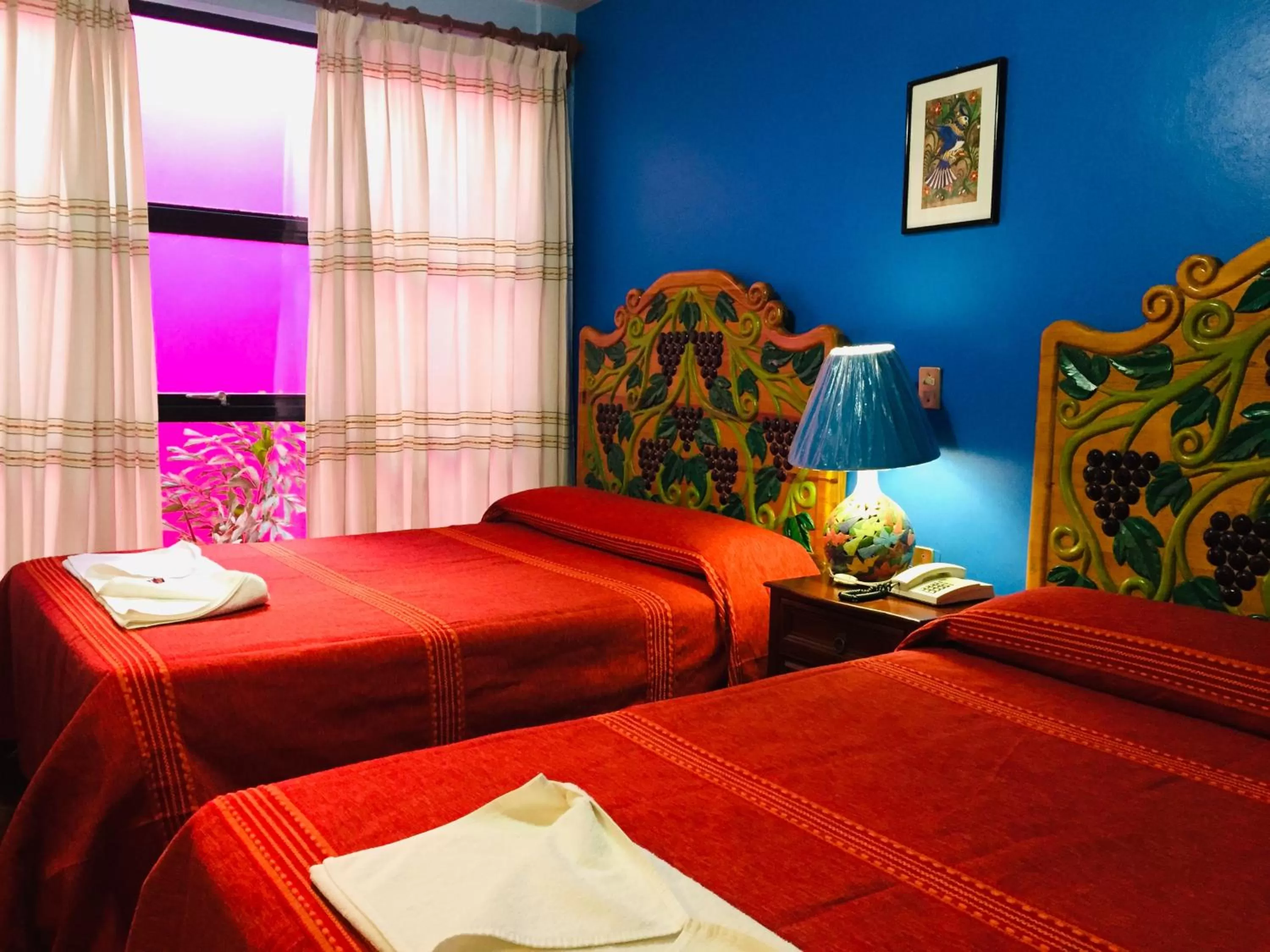 Bed in Hotel Cazomalli Oaxaca