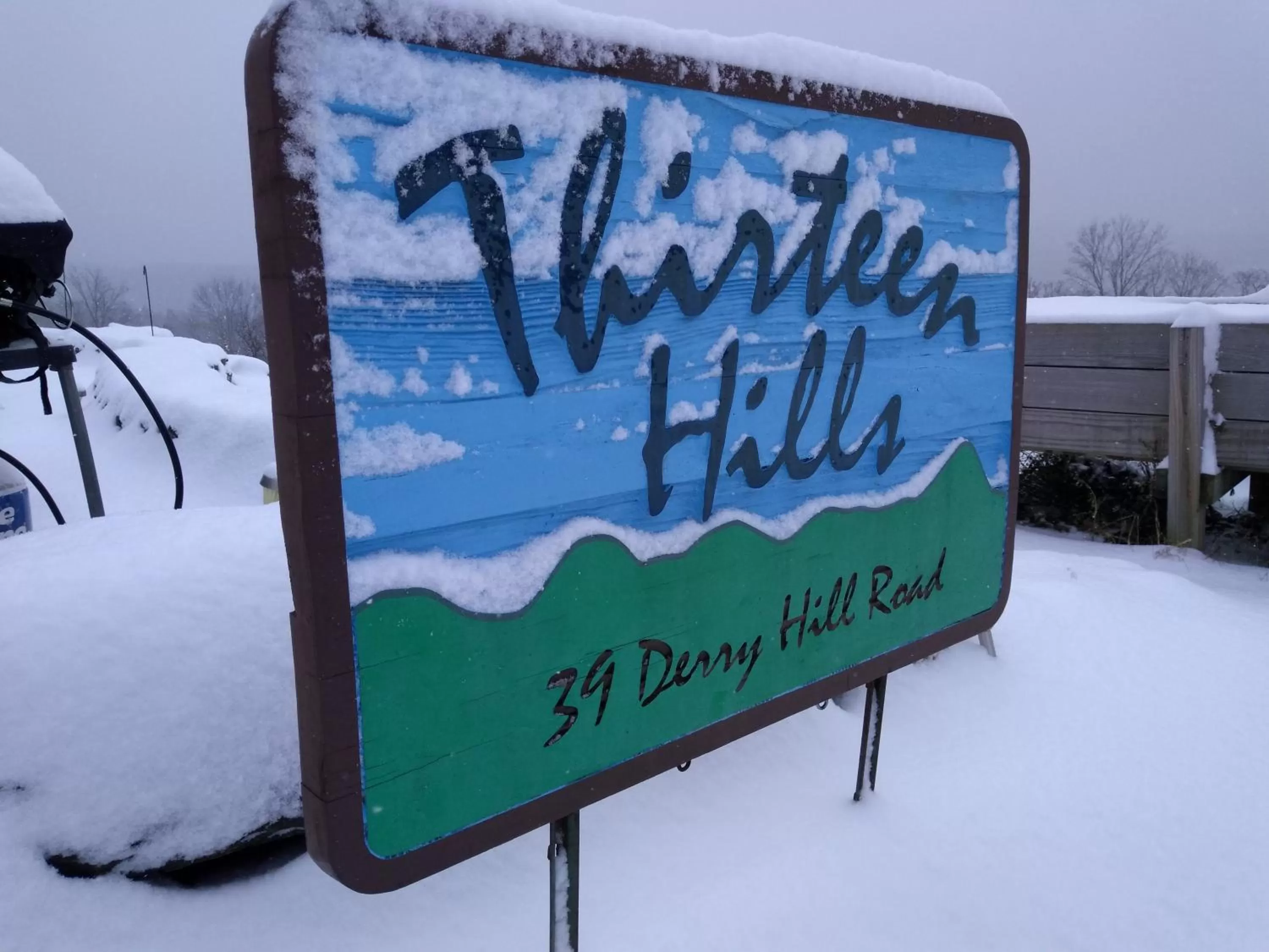 Property logo or sign in 13 Hills Bed & Breakfast