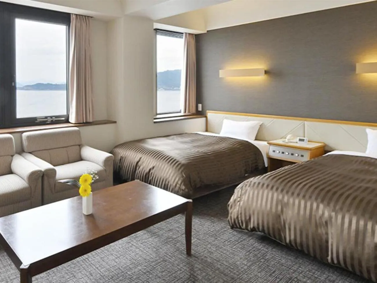 Bed in Miyajima Coral Hotel