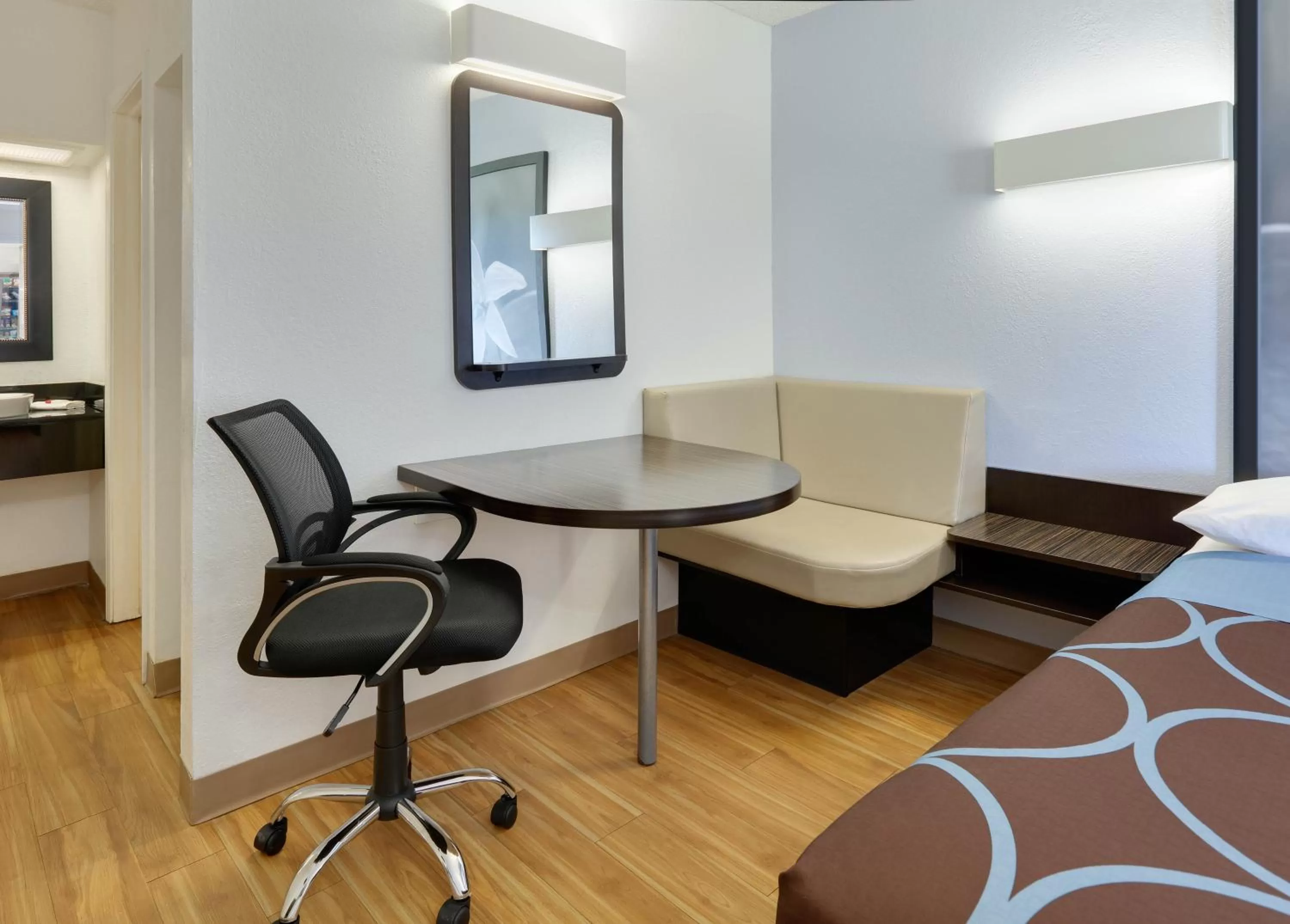 Seating area in Super 8 by Wyndham Fort Smith