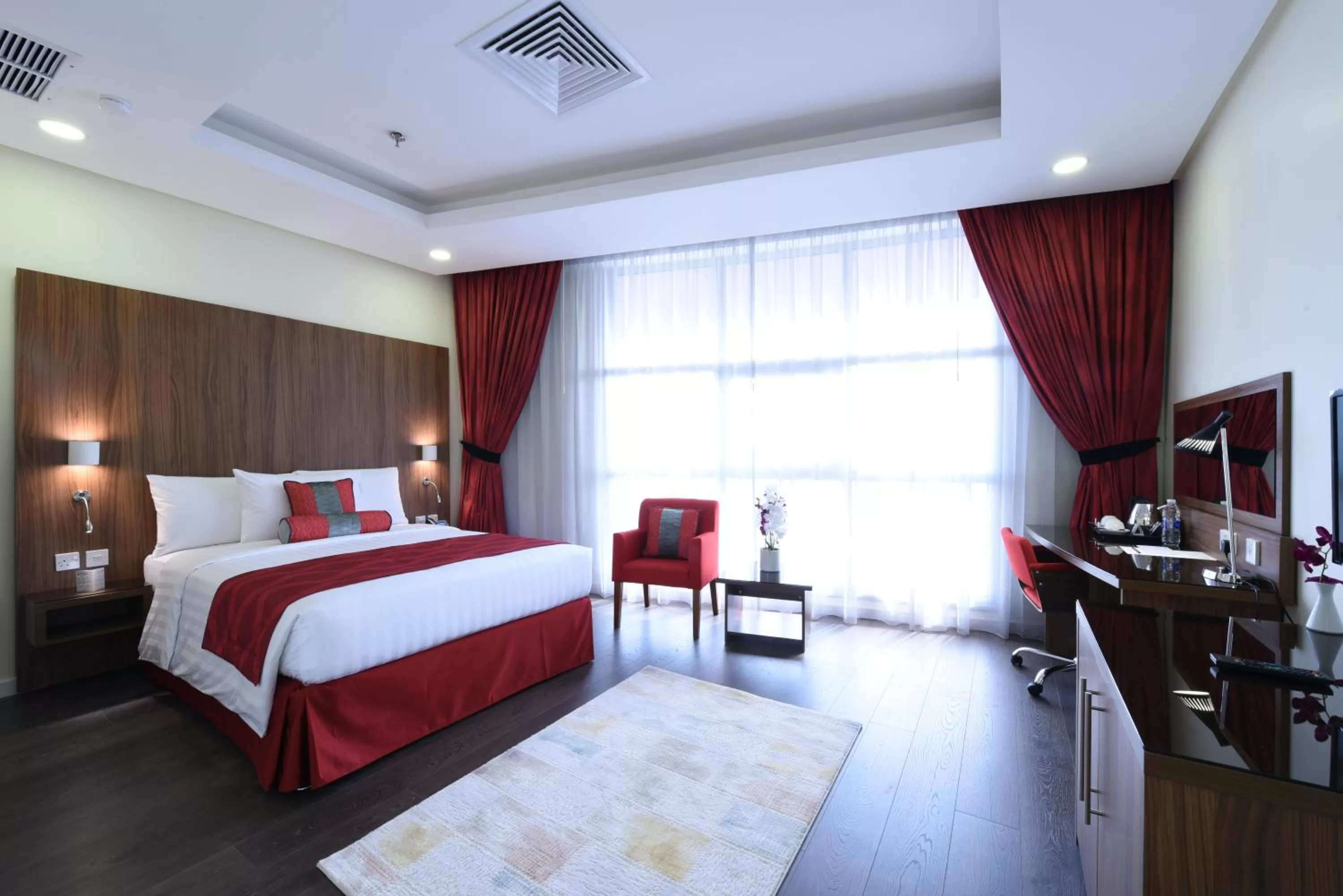 Photo of the whole room, Bed in Ramada Encore by Wyndham Kuwait Downtown