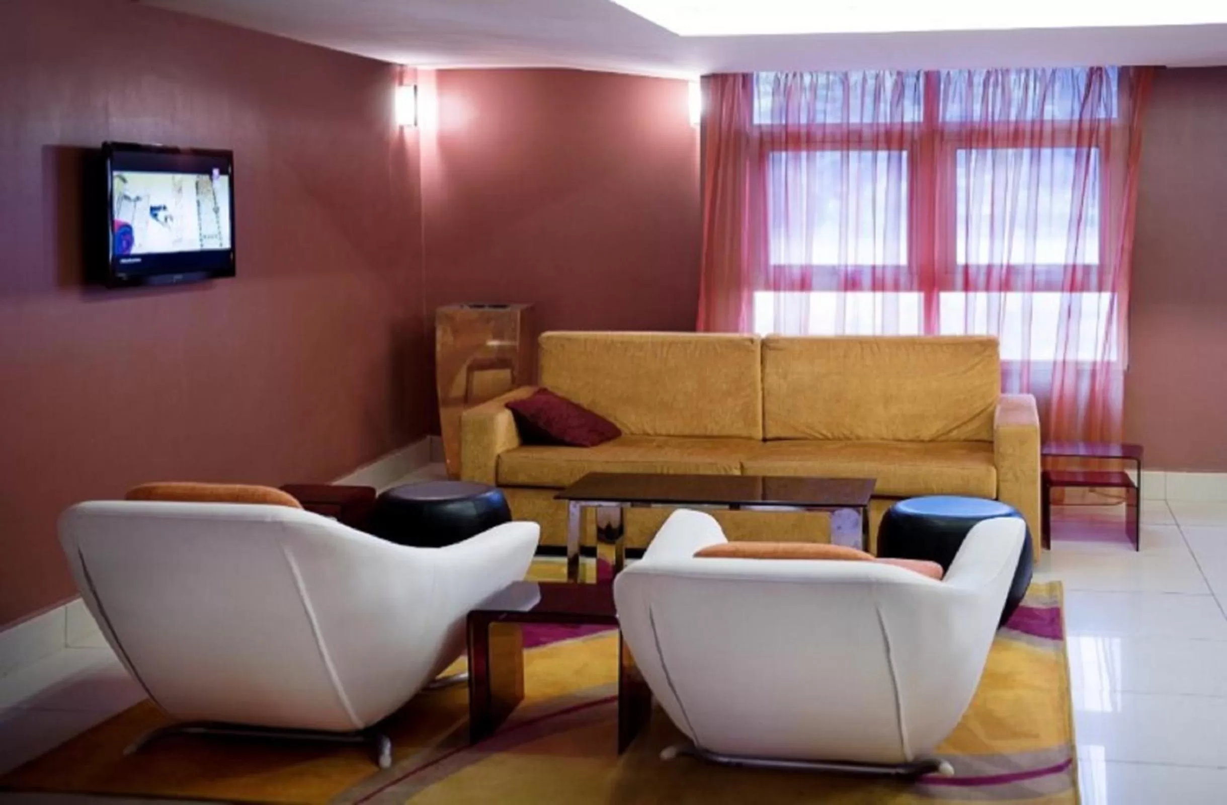 Communal lounge/ TV room in Park Inn by Radisson Abeokuta