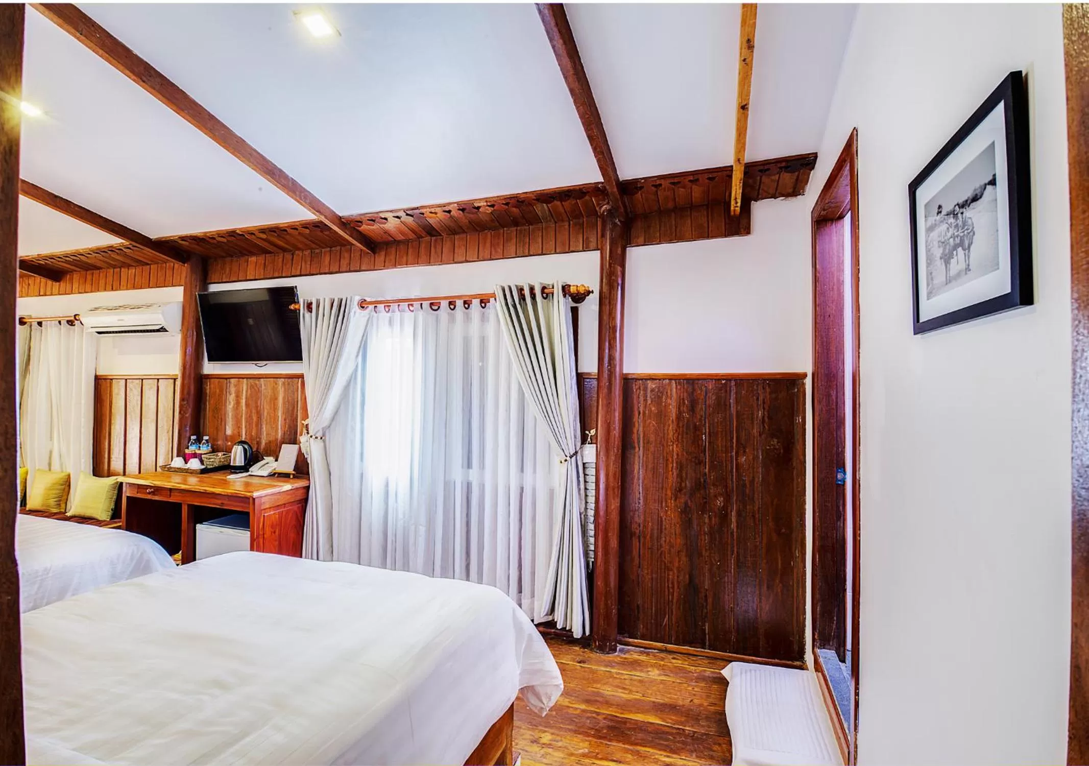 Bed in Maison Model d'Angkor