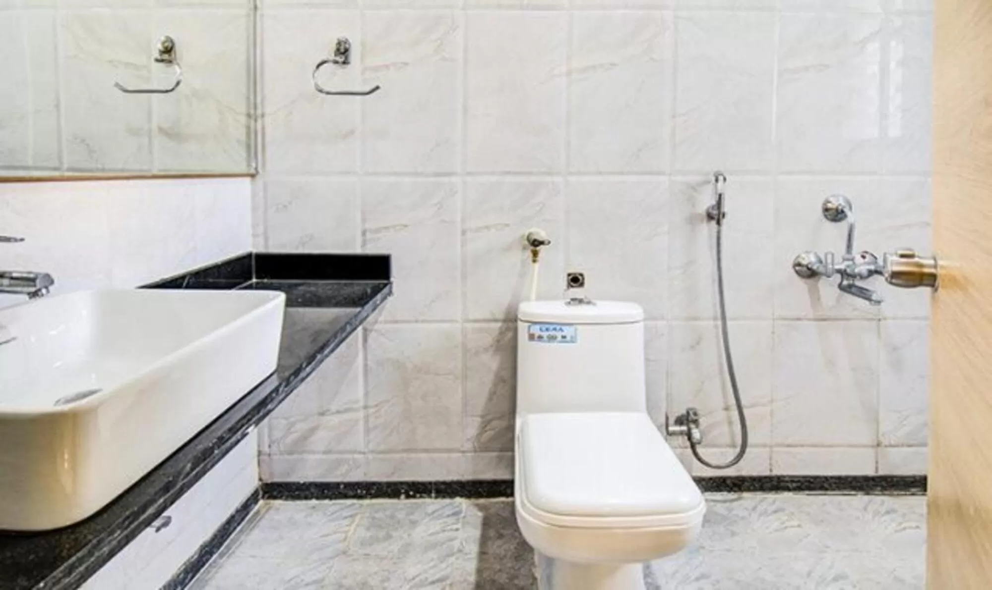 Bathroom in FabHotel Krishna Regency