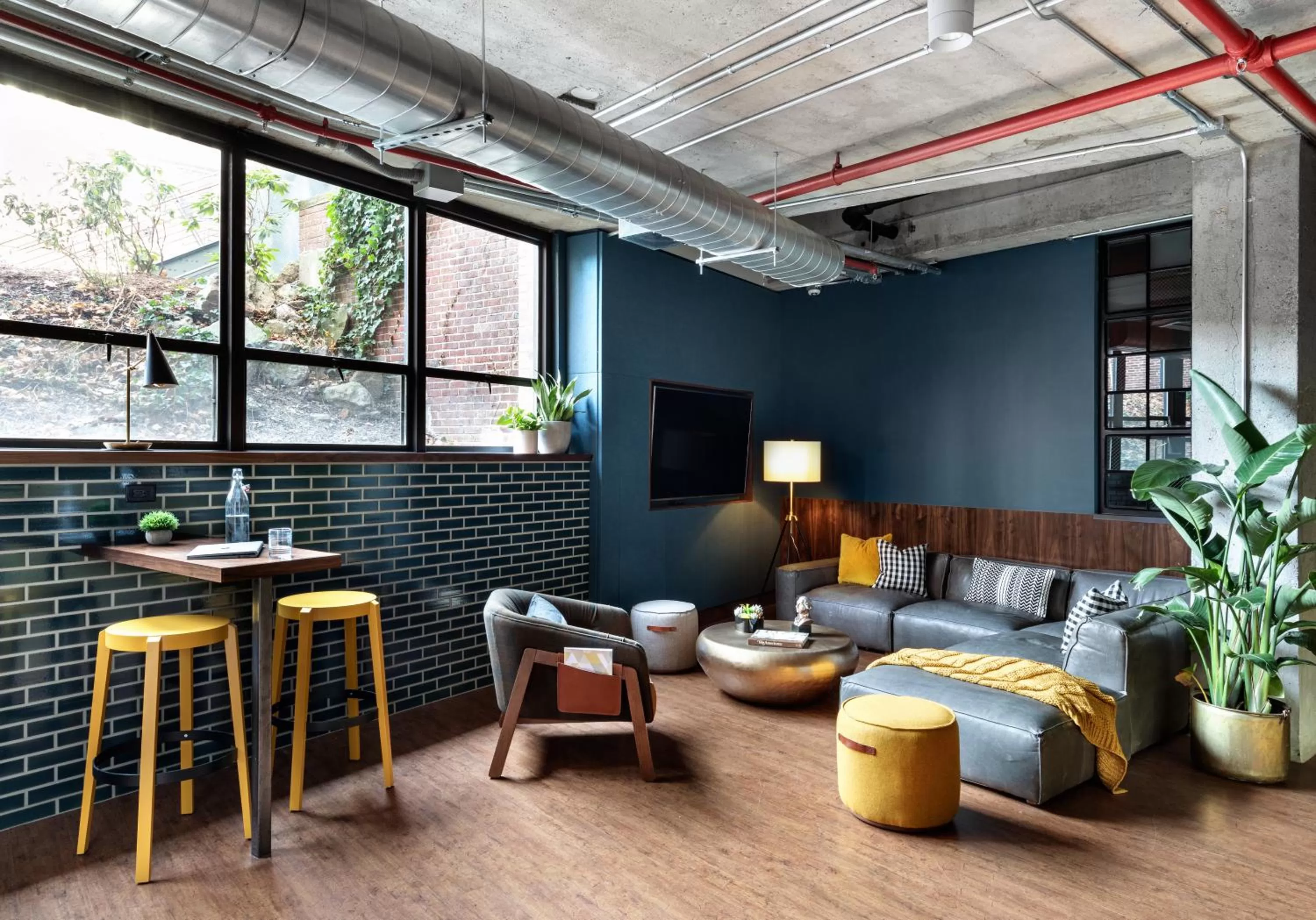 Communal lounge/ TV room in The Revolution Hotel