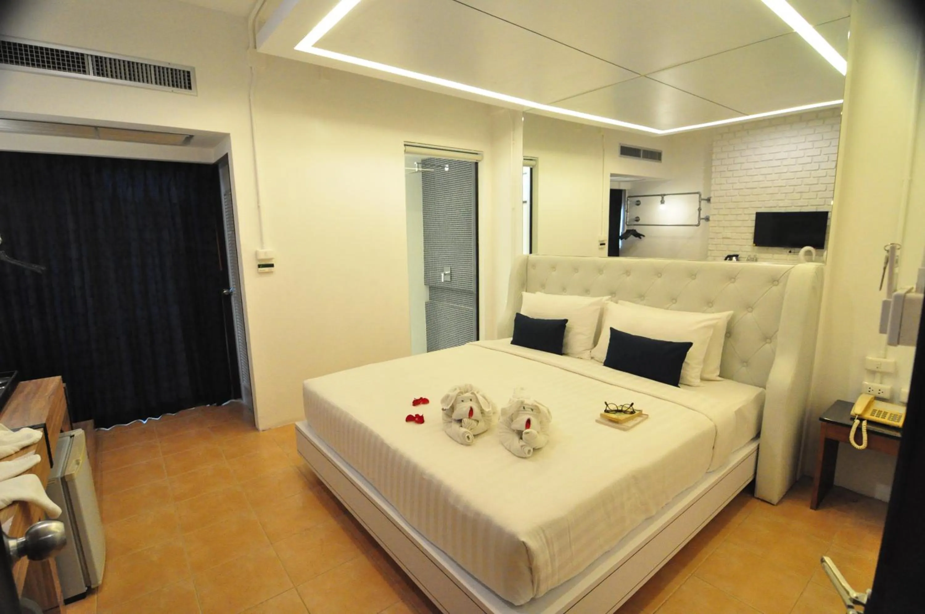 Bed in Forty Winks Phuket Hotel