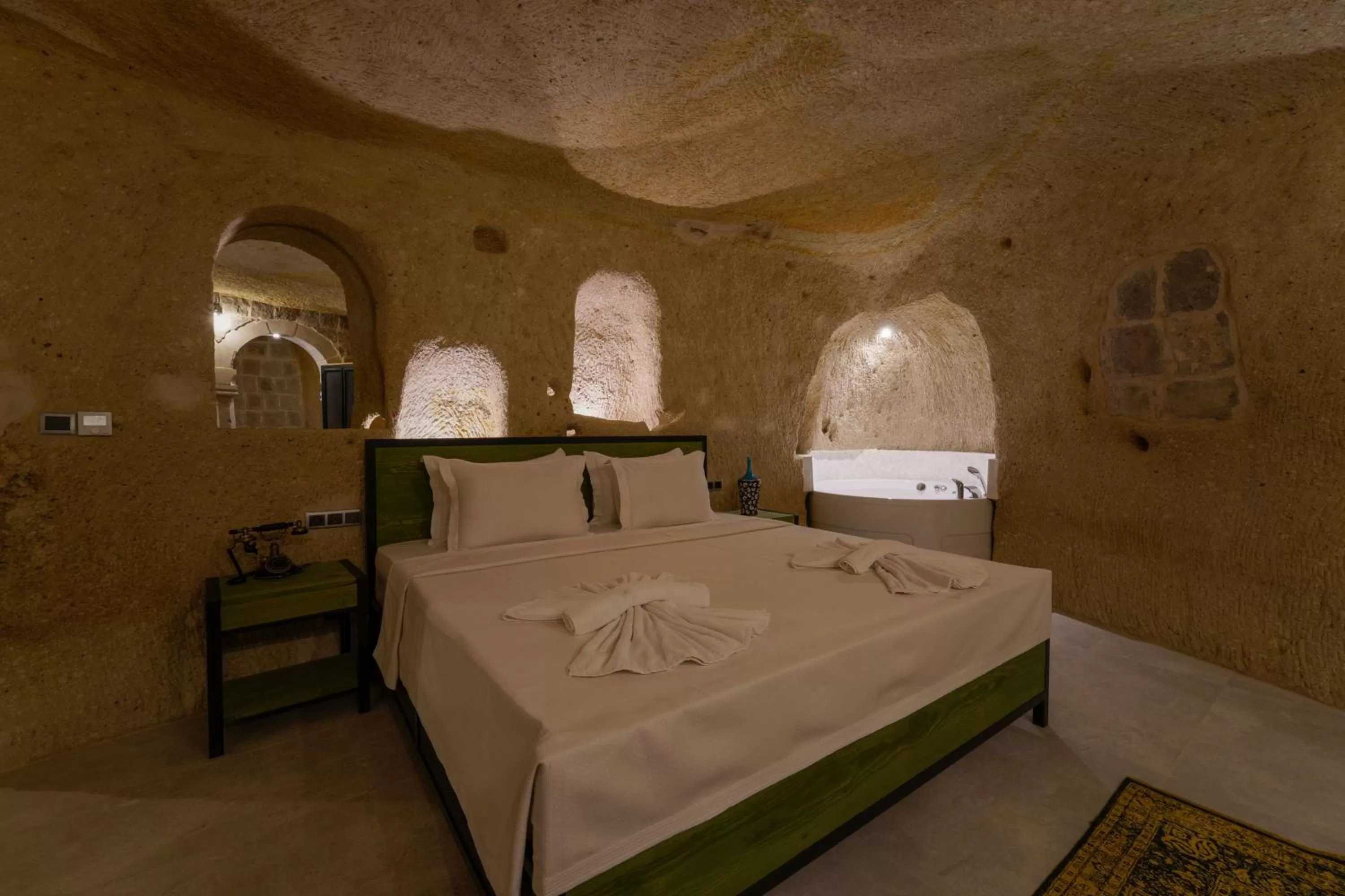 Bed in The Niche Cave Hotel