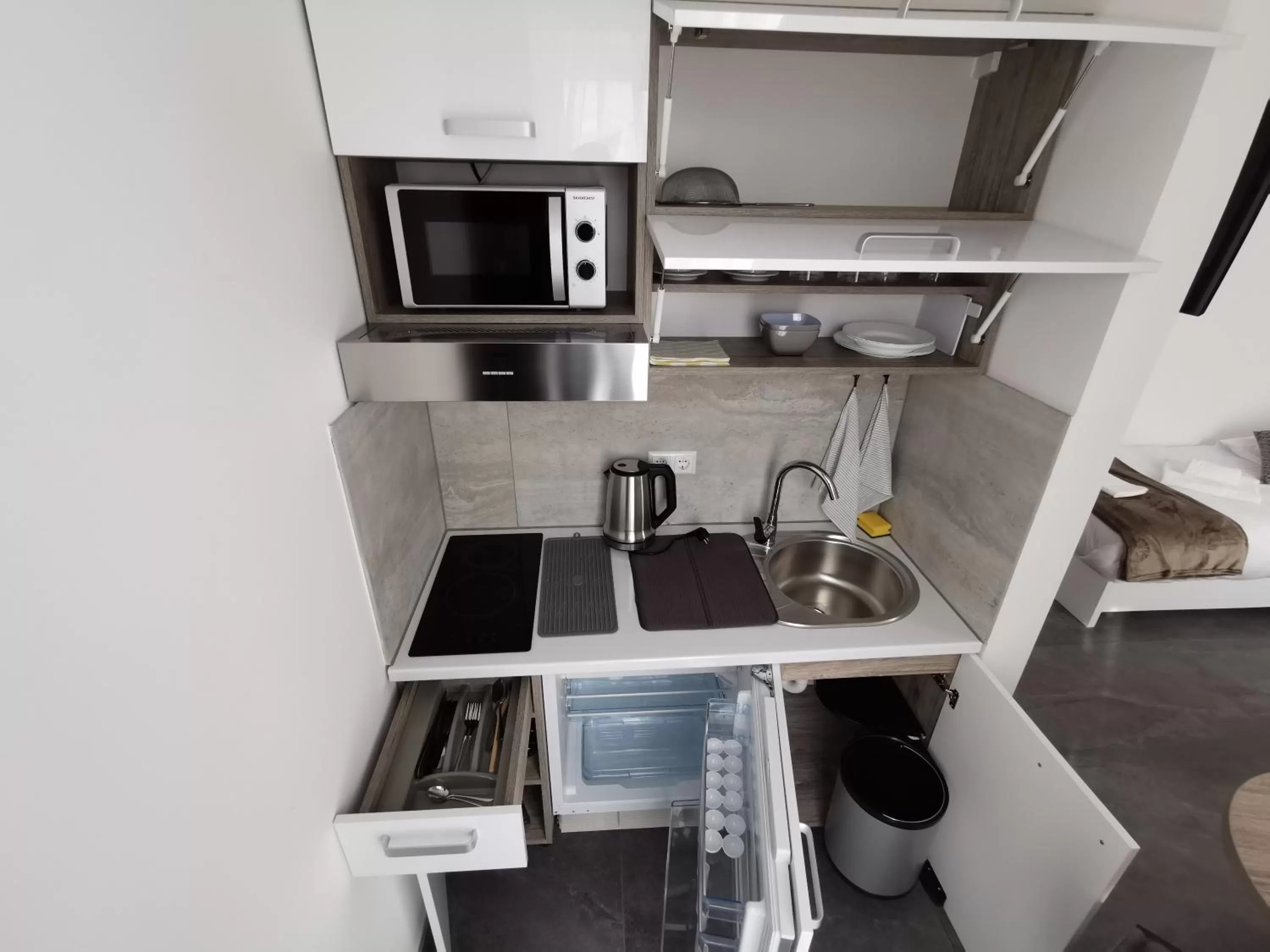 Kitchen or kitchenette in HP Apartments