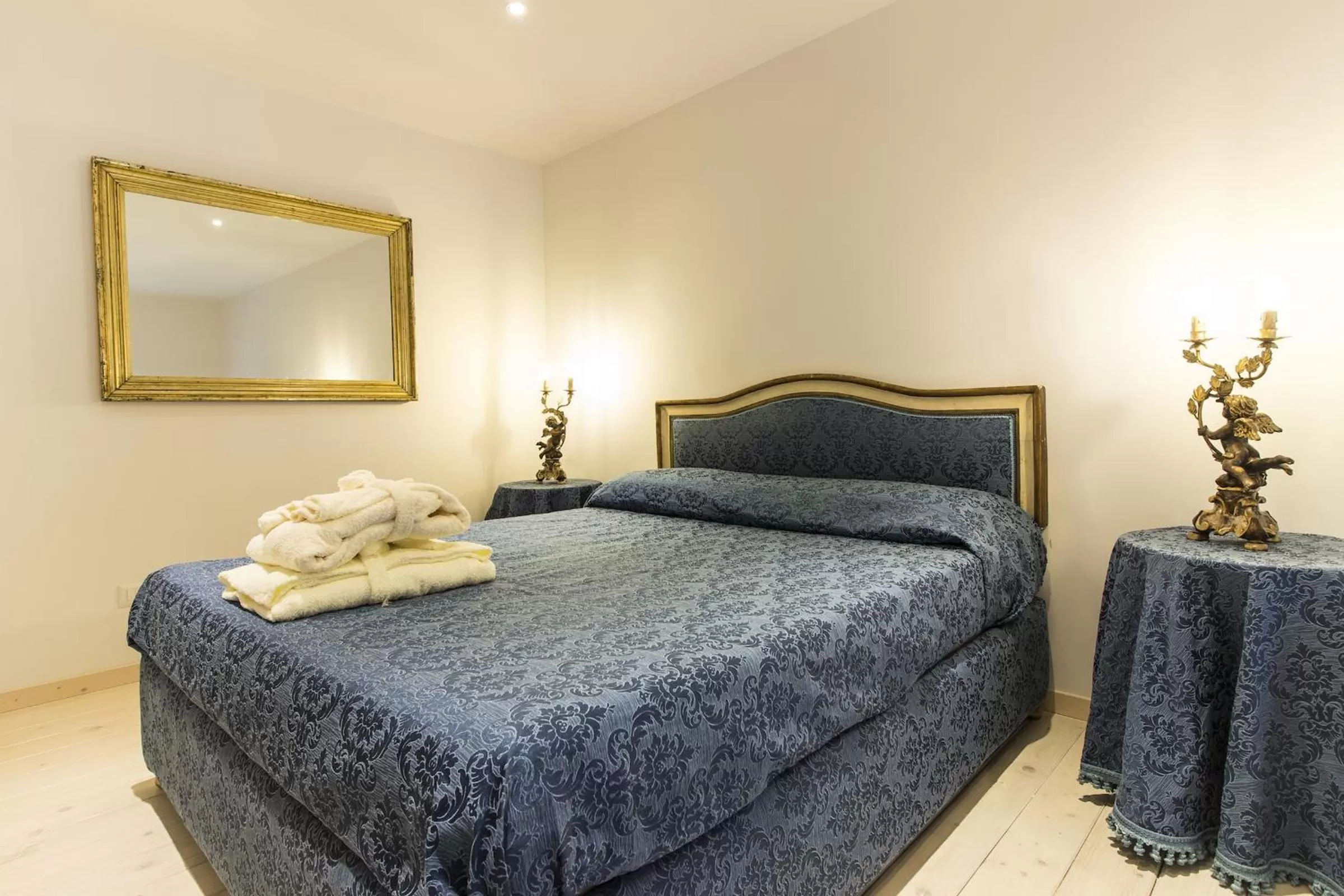 Bedroom in Palazzo d'Auria ApartHotel