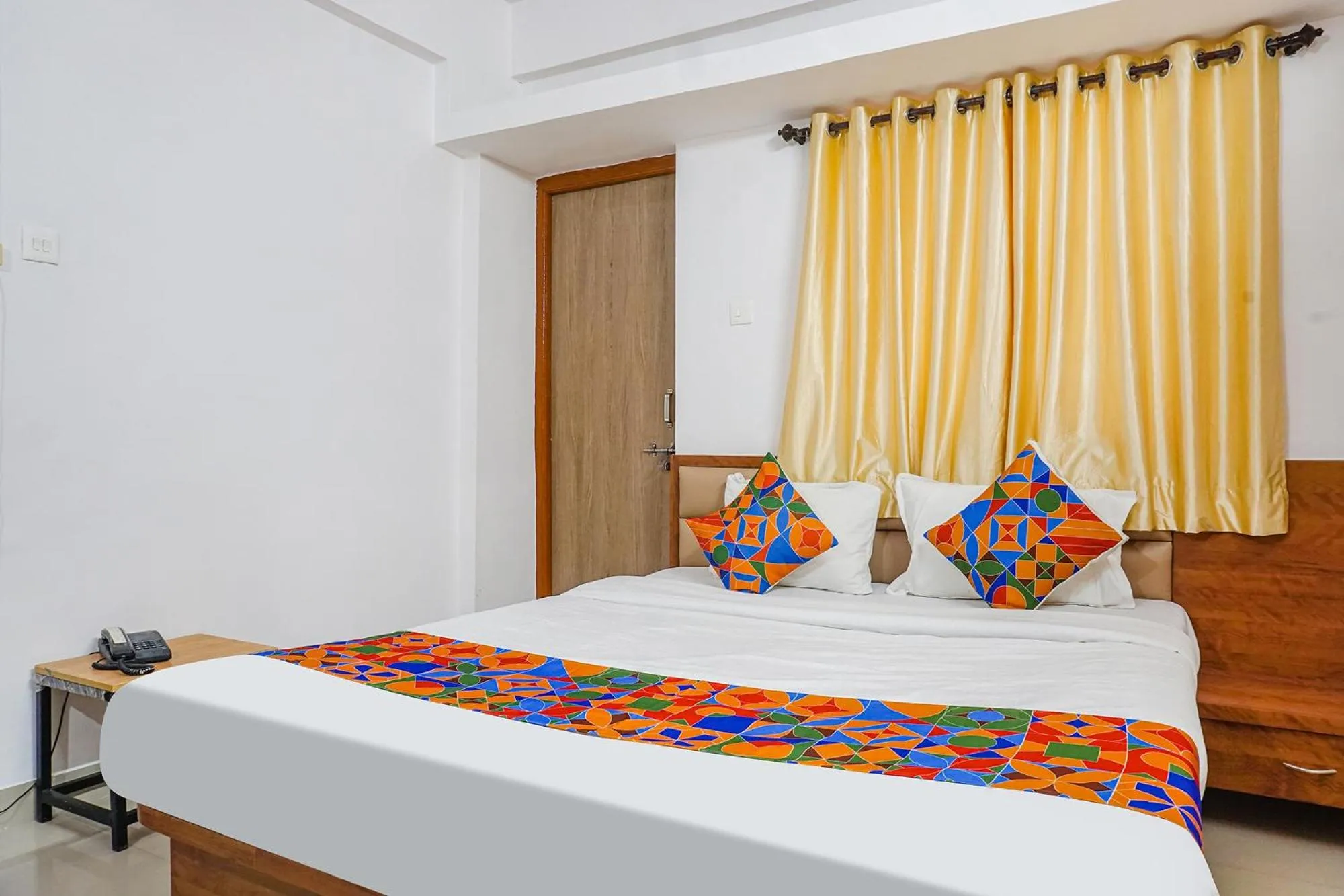 Bed in FabHotel Lake View - Chinmaya Vitthal Mandir