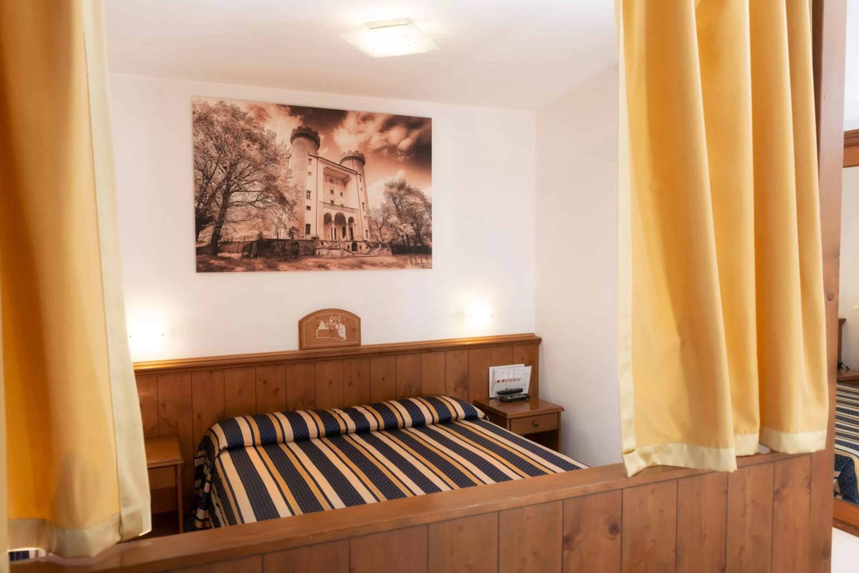 Bed in Hotel Residence Chateau