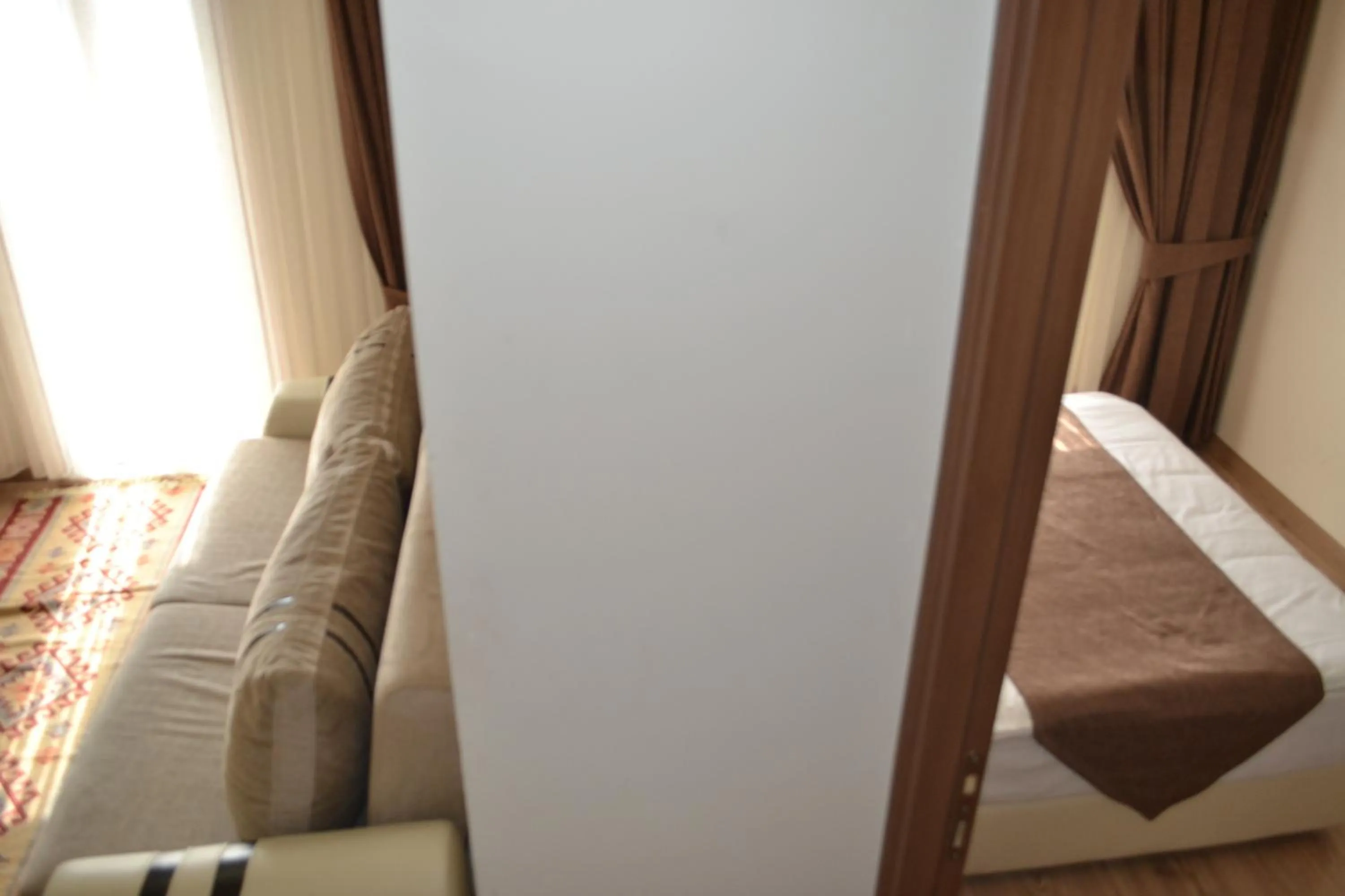 Living room, Bed in New Fatih Hotel